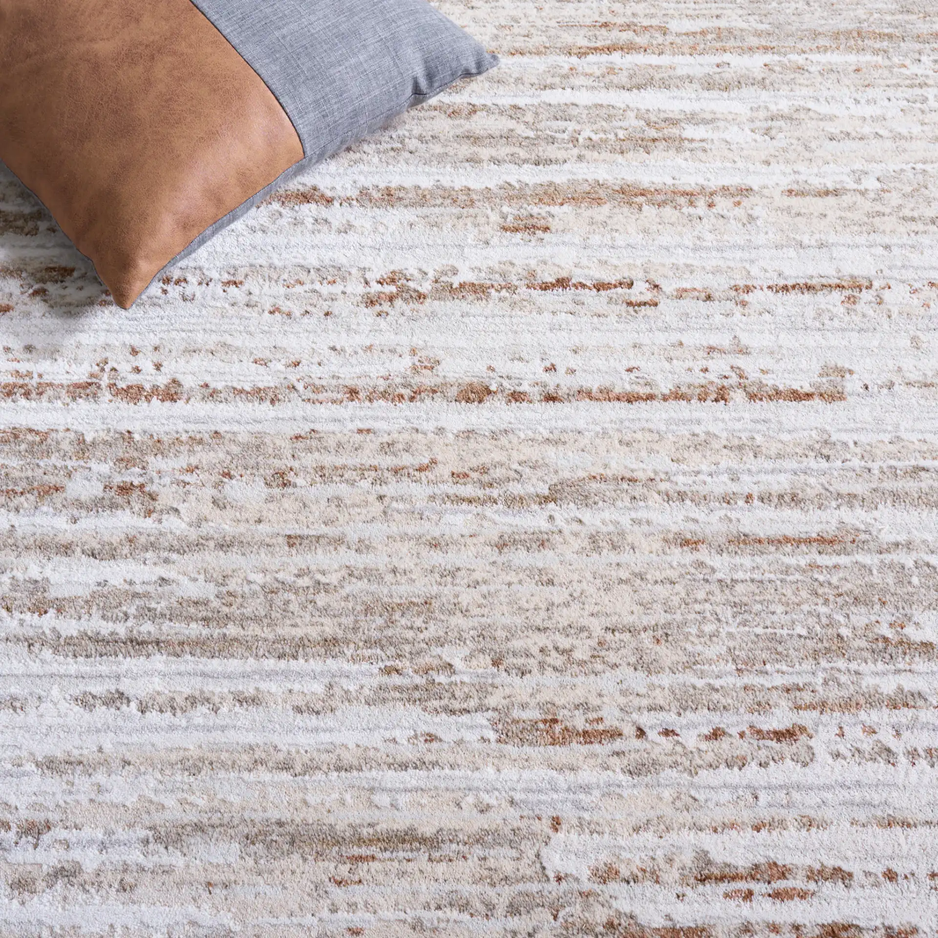 Kendal Modern Rug in Ivory / Gray Rust in a styled room