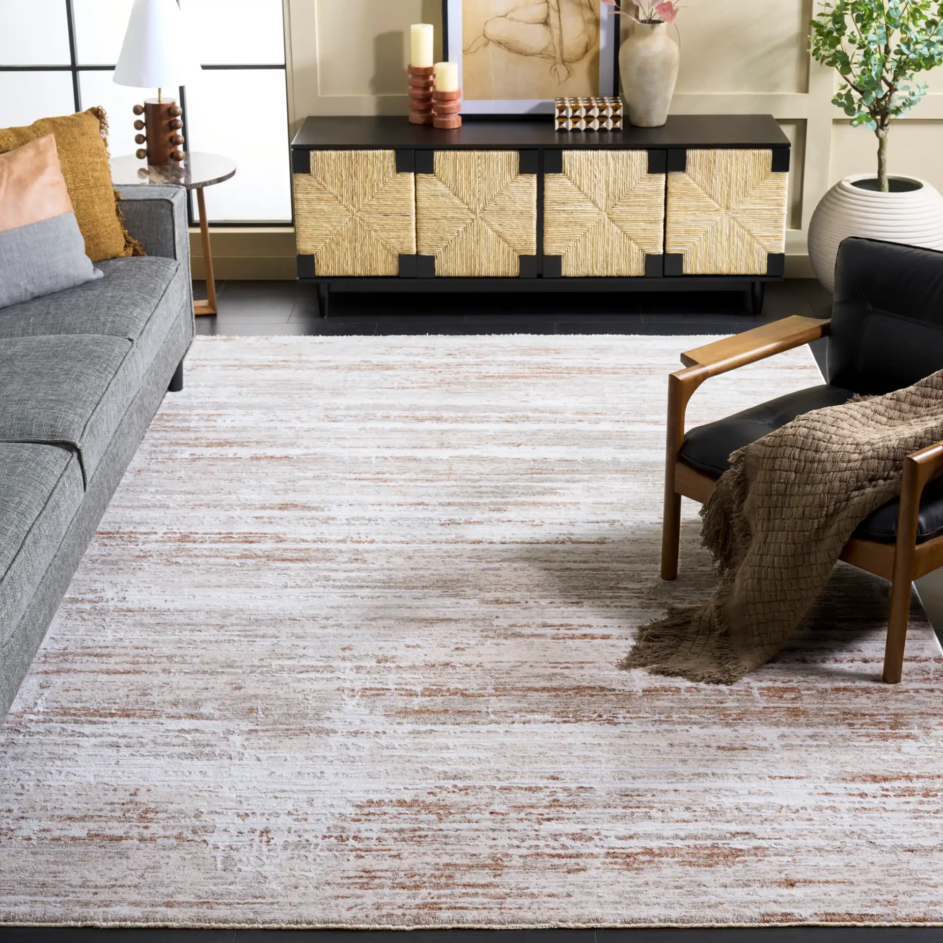Kendal Modern Rug in Ivory / Gray Rust in a styled room