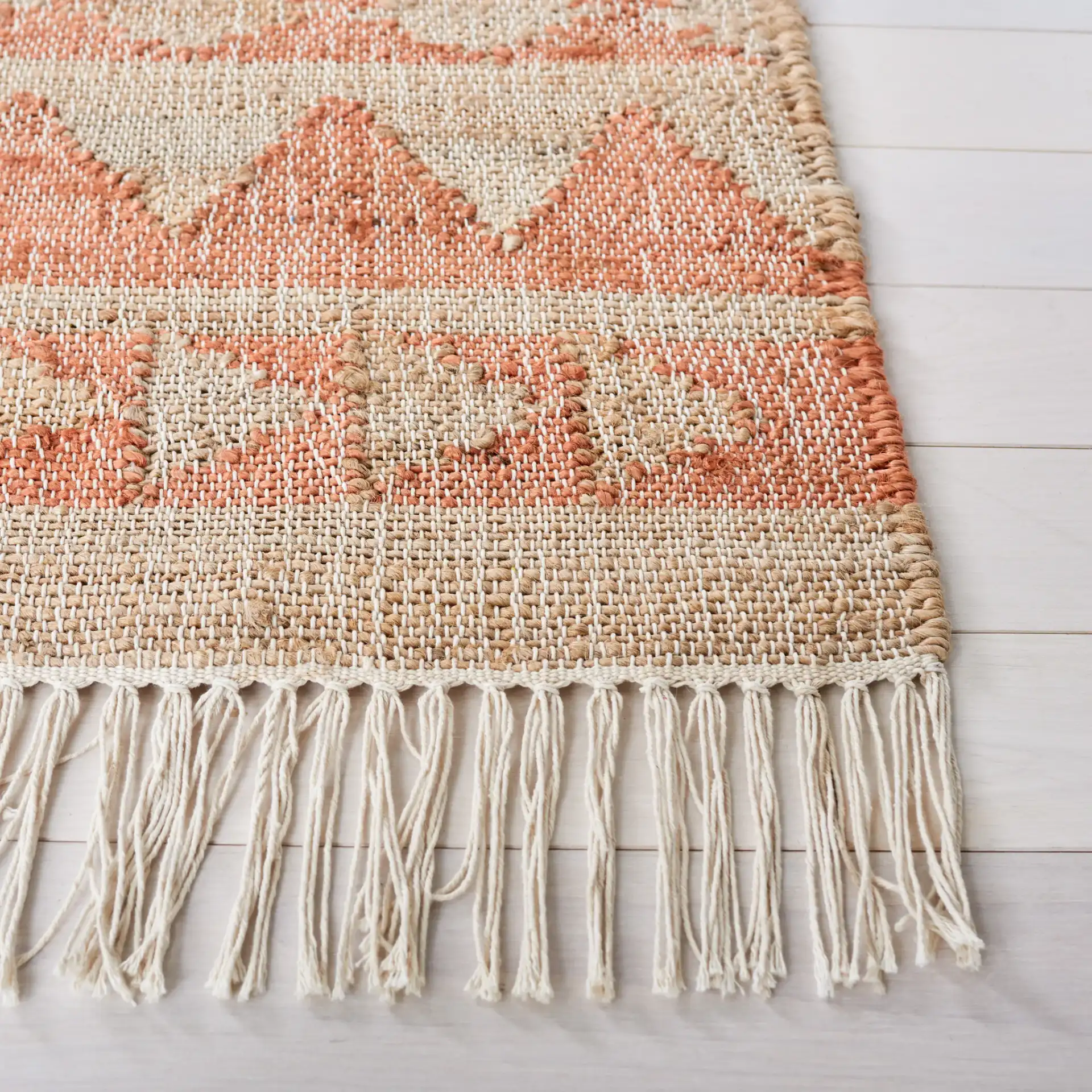 Kilim Striped Triangle Flatweave Jute Rug in Natural / Rust in a styled room