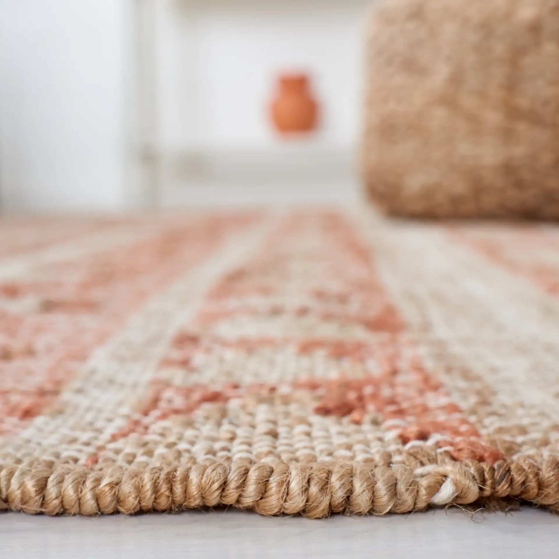 Kilim Striped Triangle Flatweave Jute Rug in Natural / Rust in a styled room