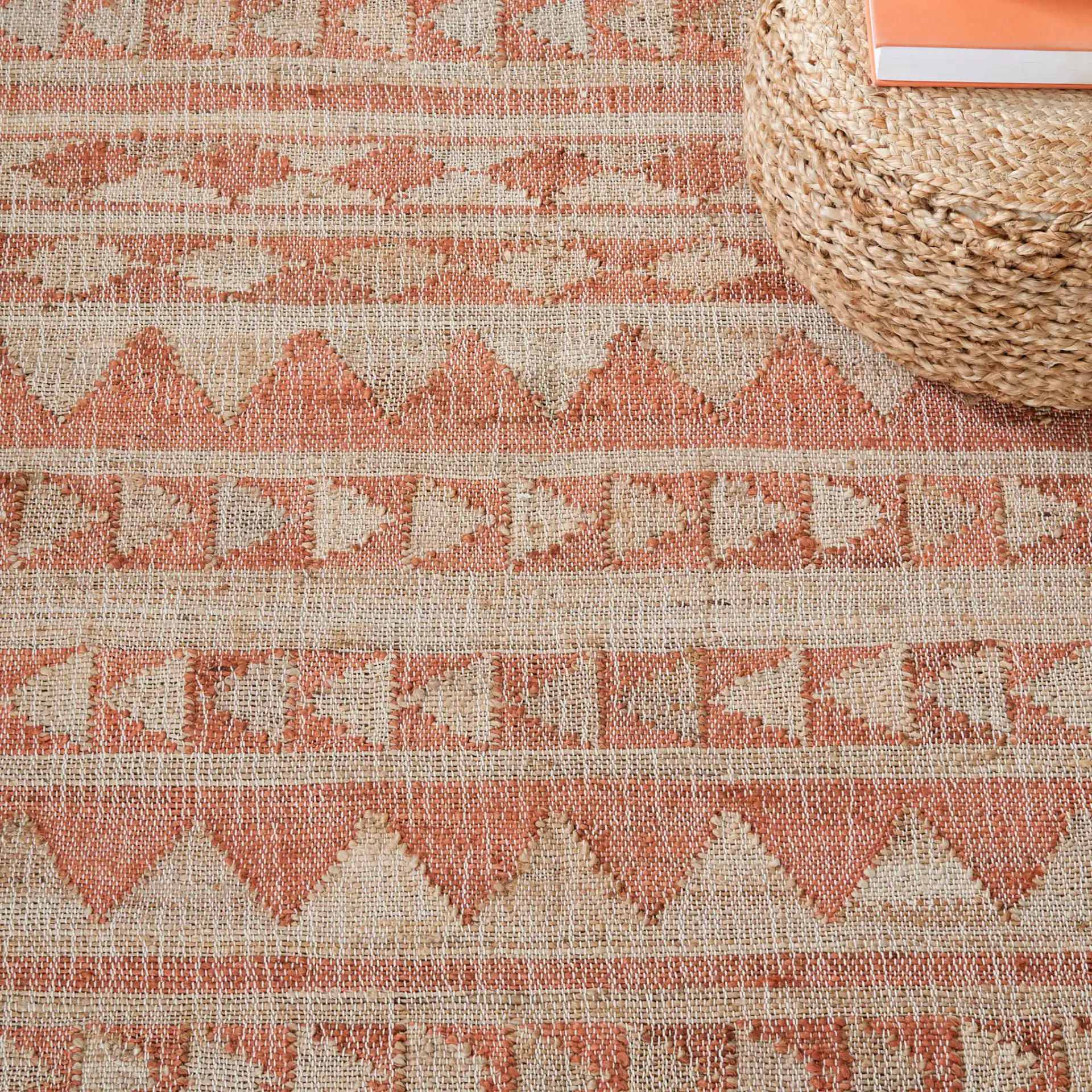 Kilim Striped Triangle Flatweave Jute Rug in Natural / Rust in a styled room