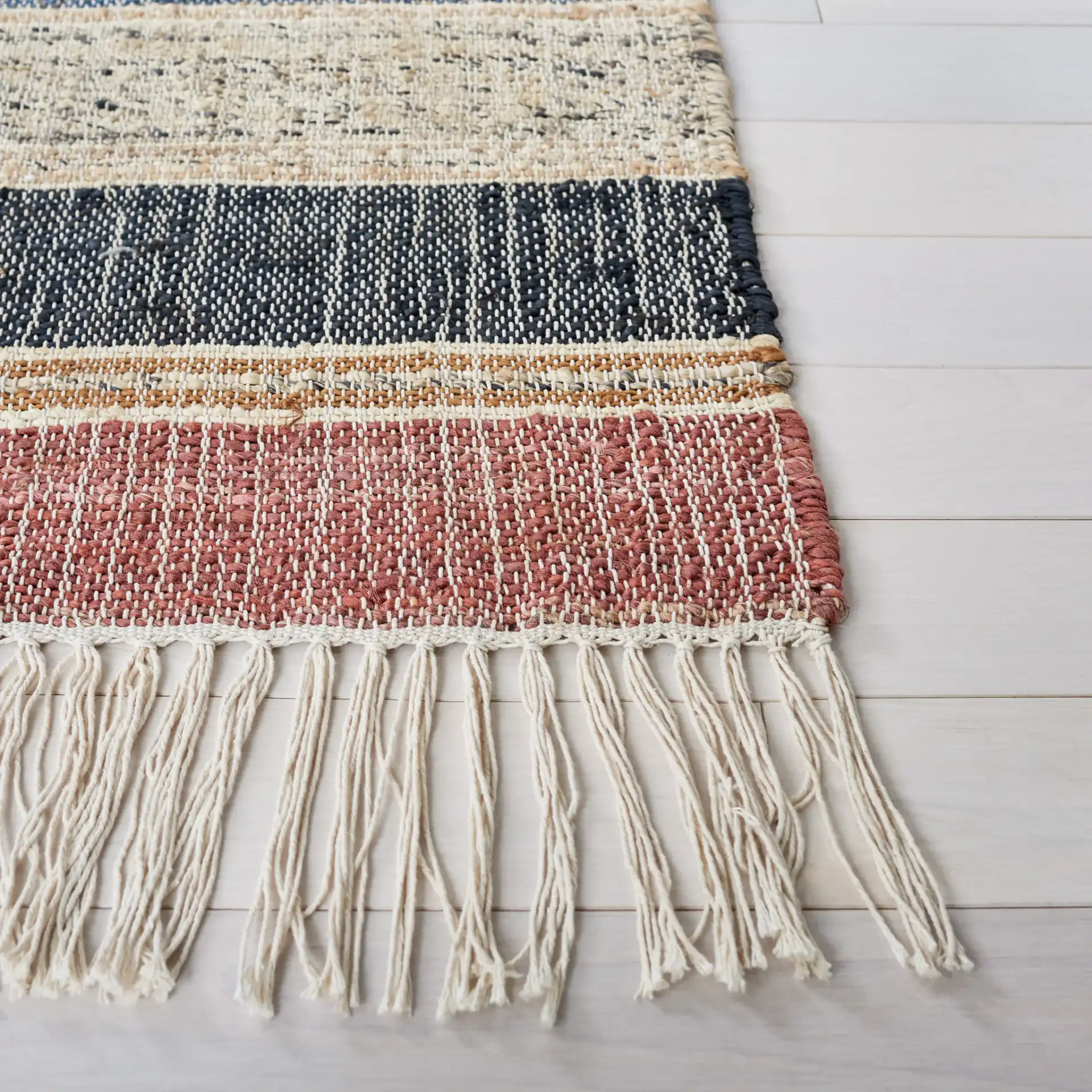 Kilim Banded Diamond Flatweave Jute Rug in Blue / Rust in a styled room