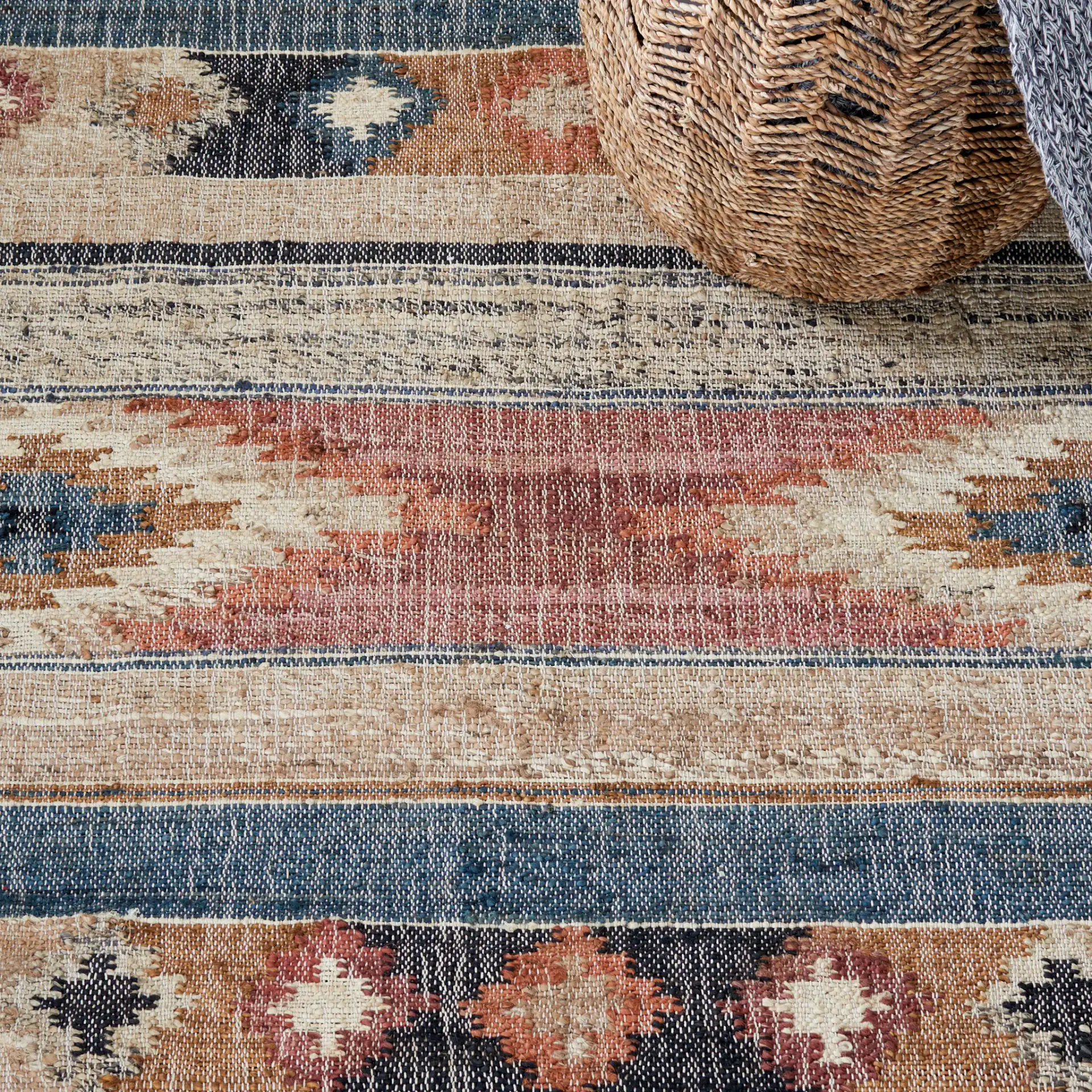 Kilim Banded Diamond Flatweave Jute Rug in Blue / Rust in a styled room