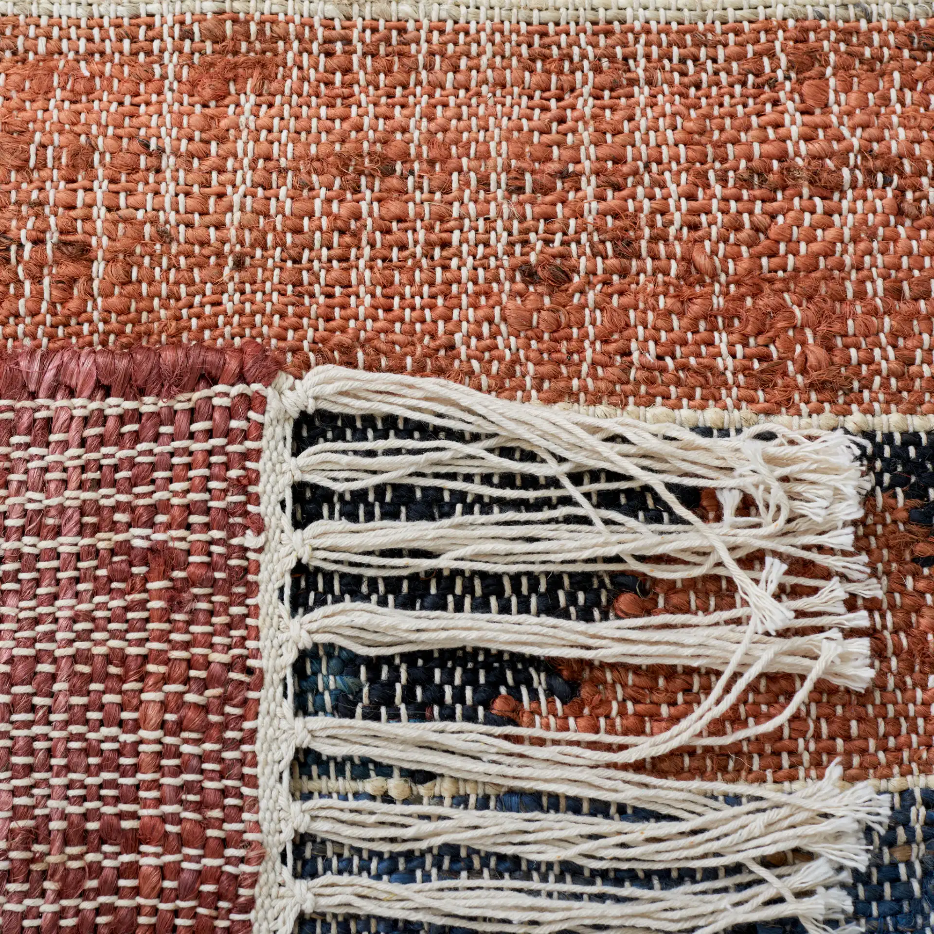 Kilim Banded Diamond Flatweave Jute Rug in Blue / Rust in a styled room