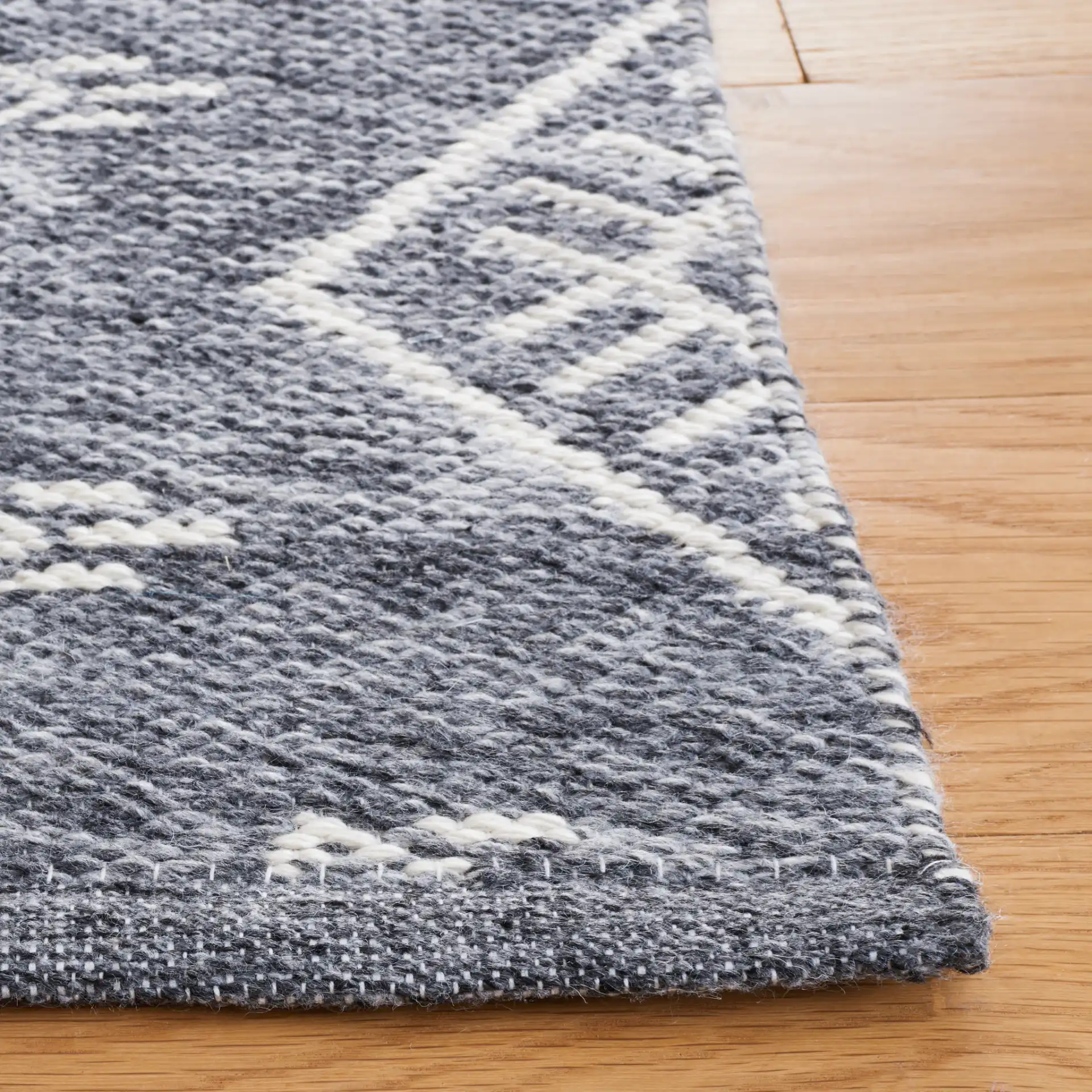 Kilim Nested Diamond Flatweave Rug in Gray / Ivory in a styled room
