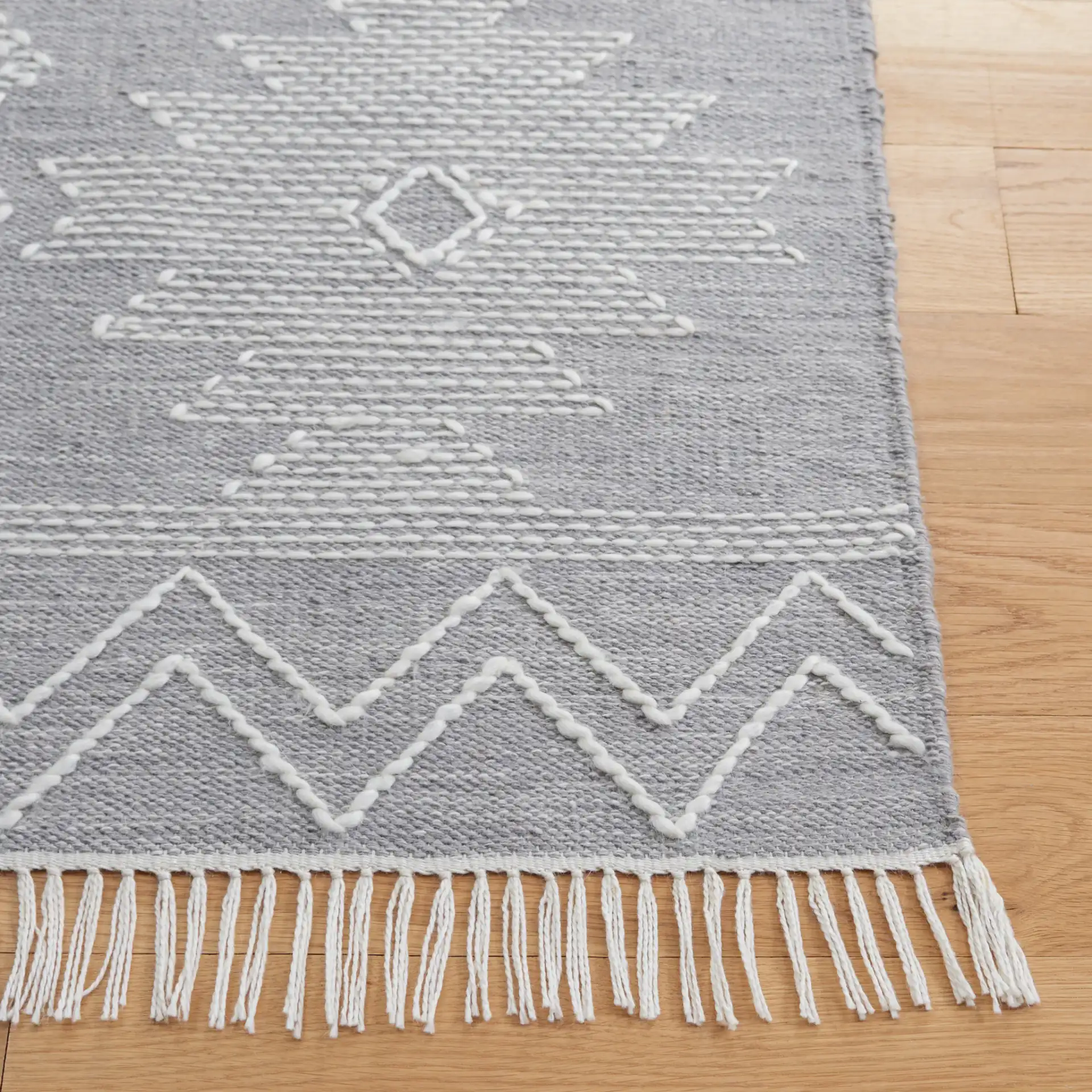 Kilim Banded Tribal Flatweave Rug in Gray / Ivory in a styled room