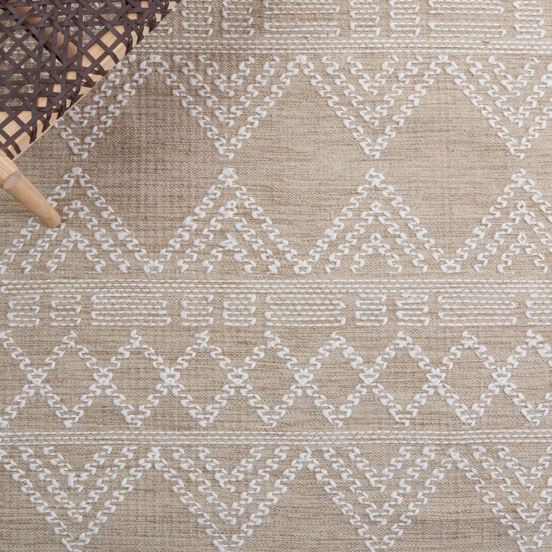 Kilim Chevron Diamond Flatweave Rug in Beige / Ivory in a styled room