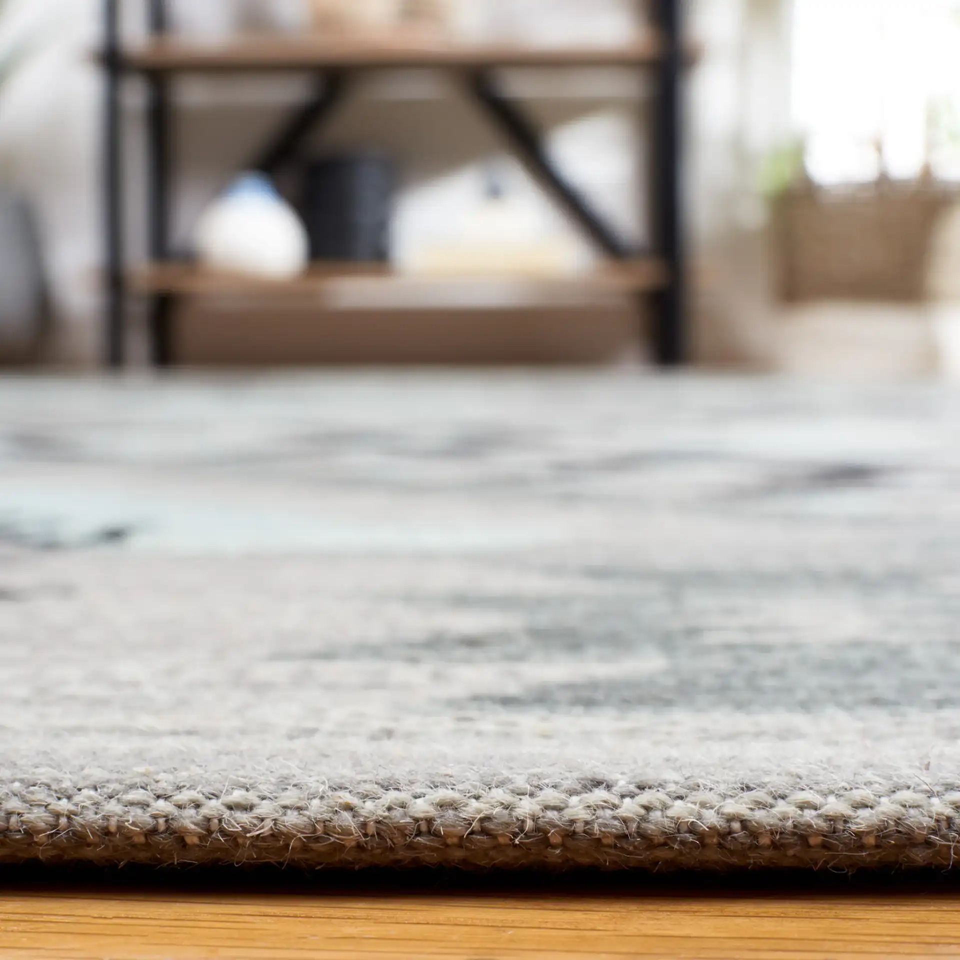 Kilim Tribal Diamond Medallion Hand-Woven Rug in Gray / Black in a styled room