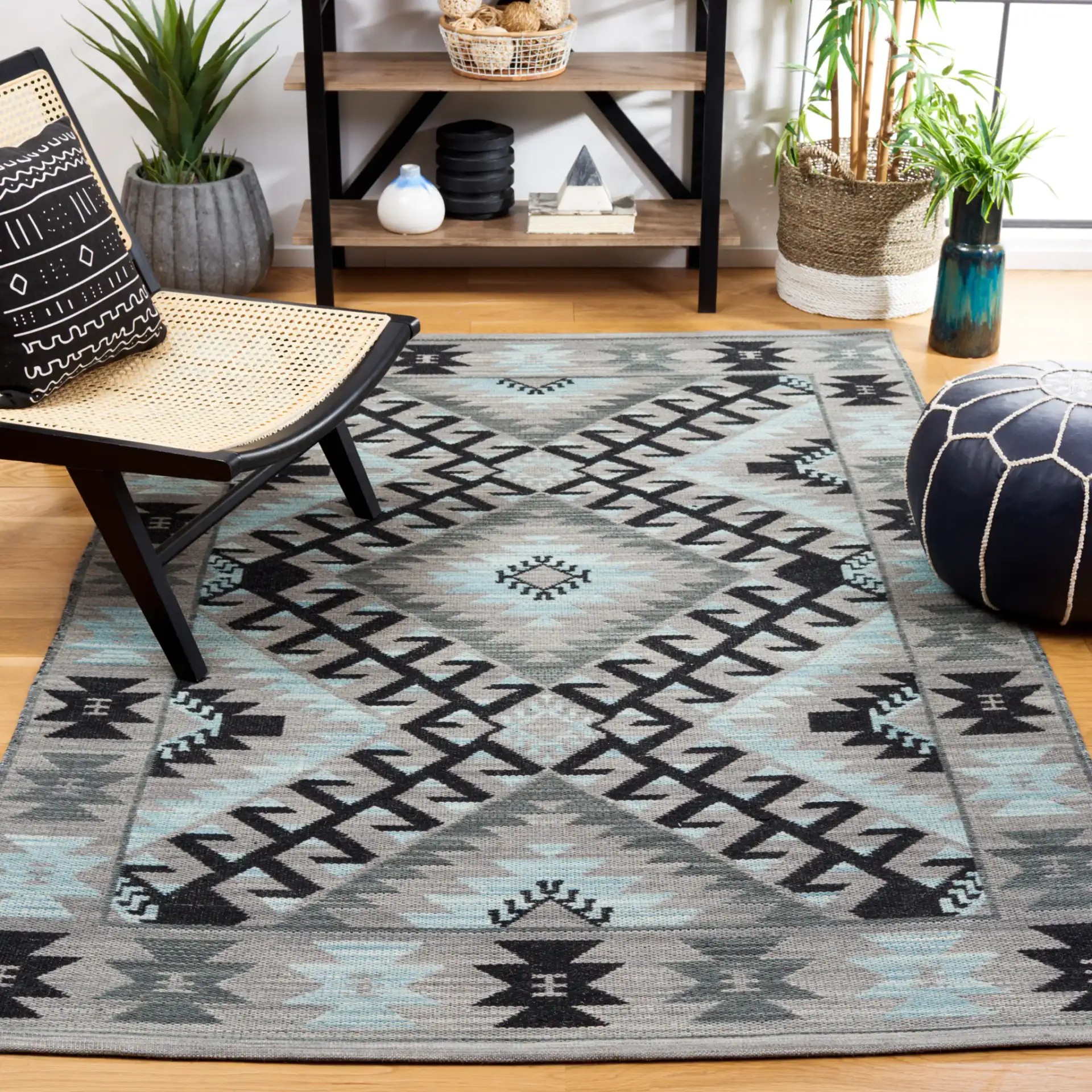 Kilim Tribal Diamond Medallion Hand-Woven Rug in Gray / Black in a styled room