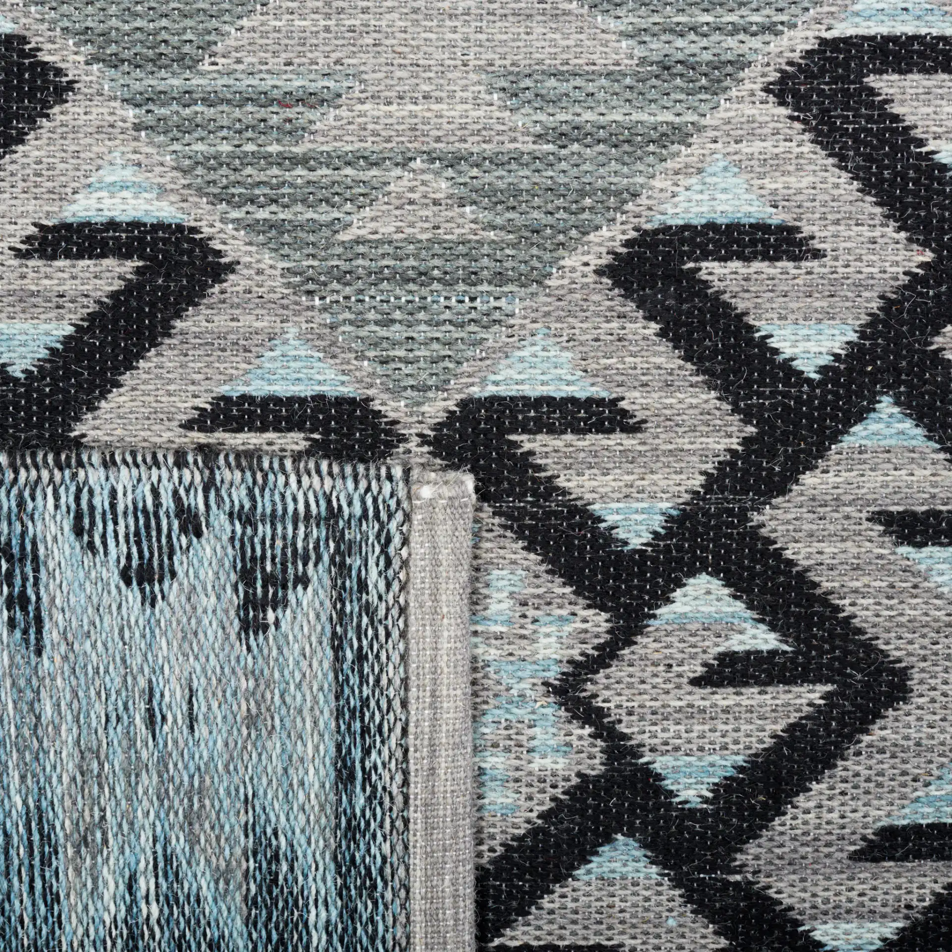 Kilim Tribal Diamond Medallion Hand-Woven Rug in Gray / Black in a styled room