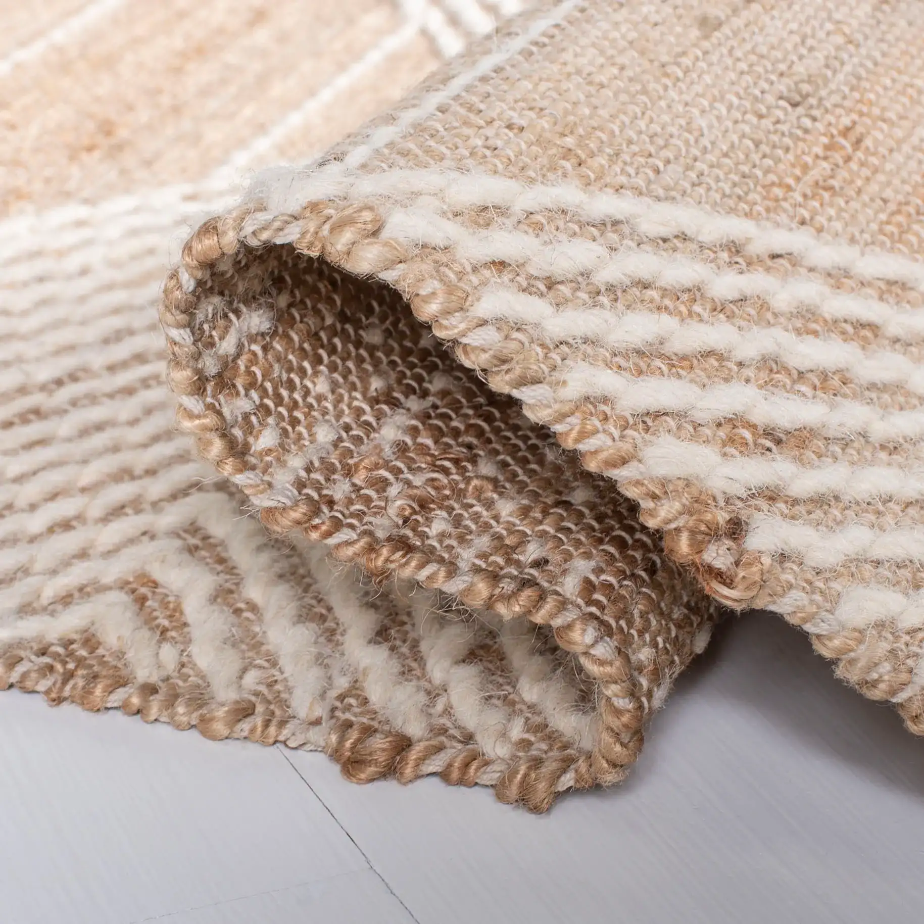 Kilim Coastal Concentric Diamond Hand-Woven Rug in Natural in a styled room