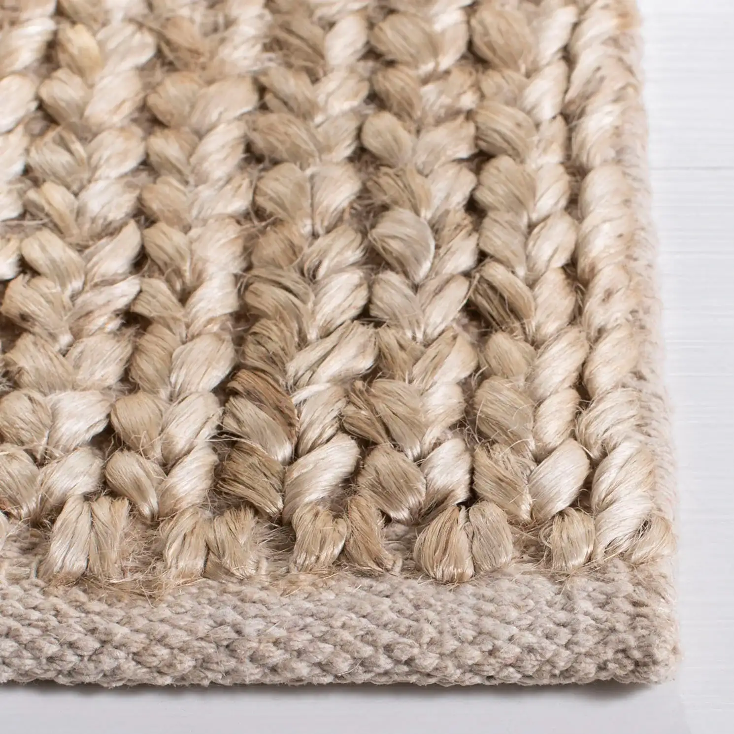 Kilim Coastal Geometric Jute Hand-Woven Rug in Natural / Beige in a styled room