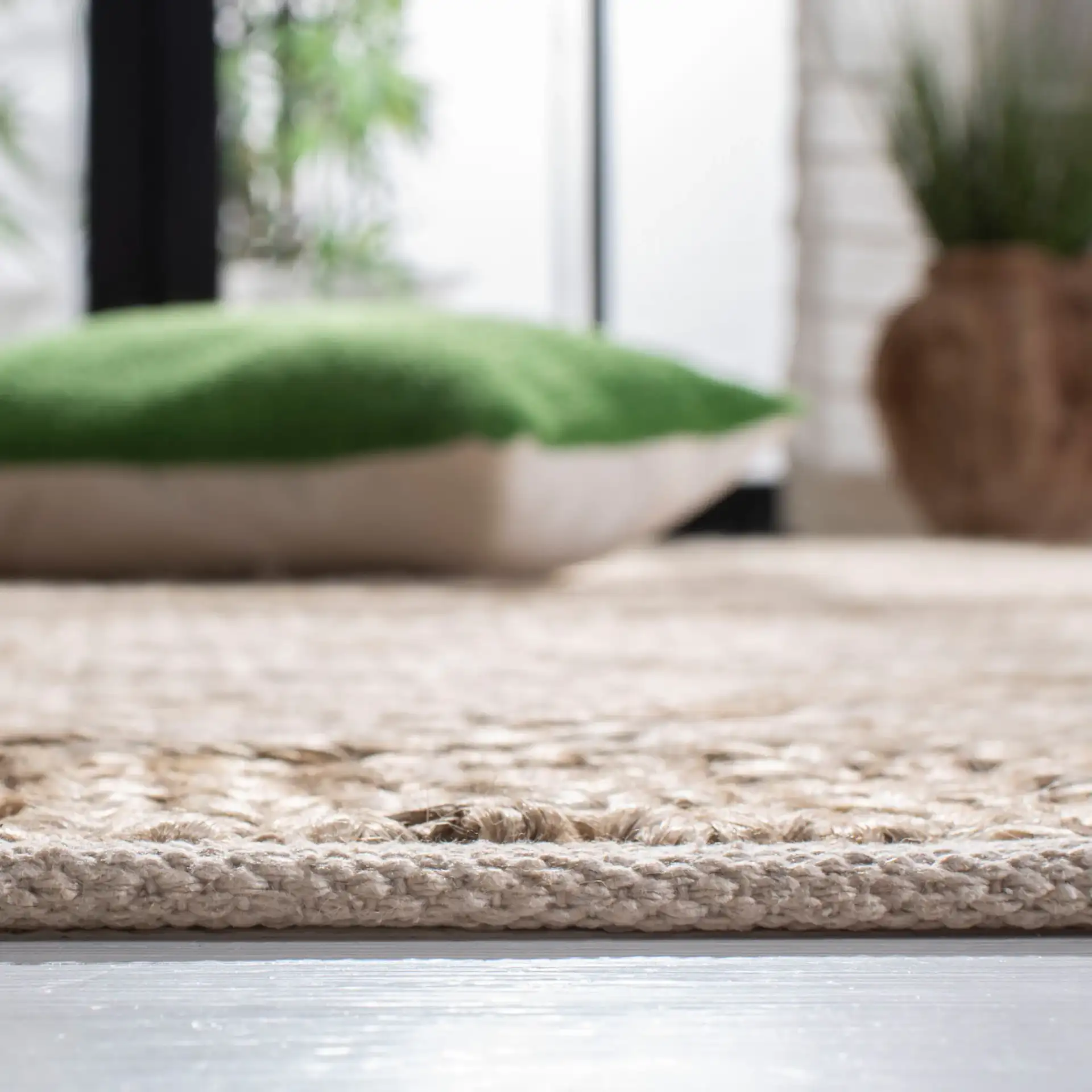 Kilim Coastal Geometric Jute Hand-Woven Rug in Natural / Beige in a styled room