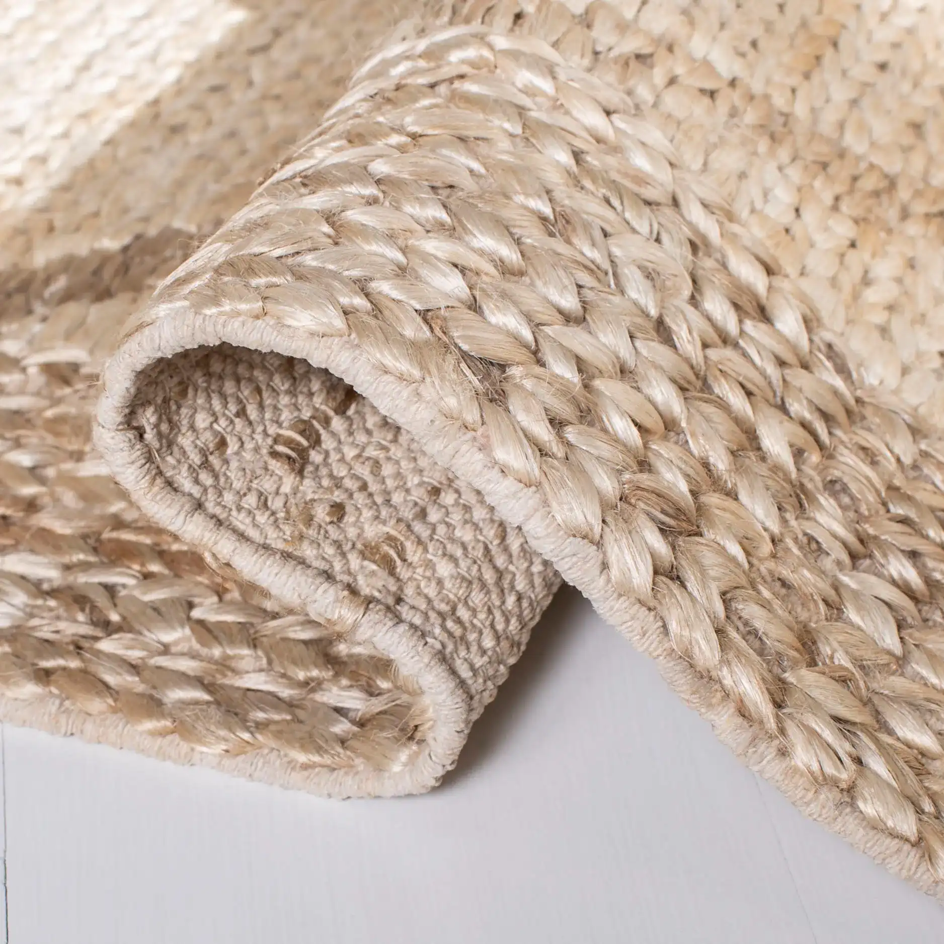 Kilim Coastal Geometric Jute Hand-Woven Rug in Natural / Beige in a styled room