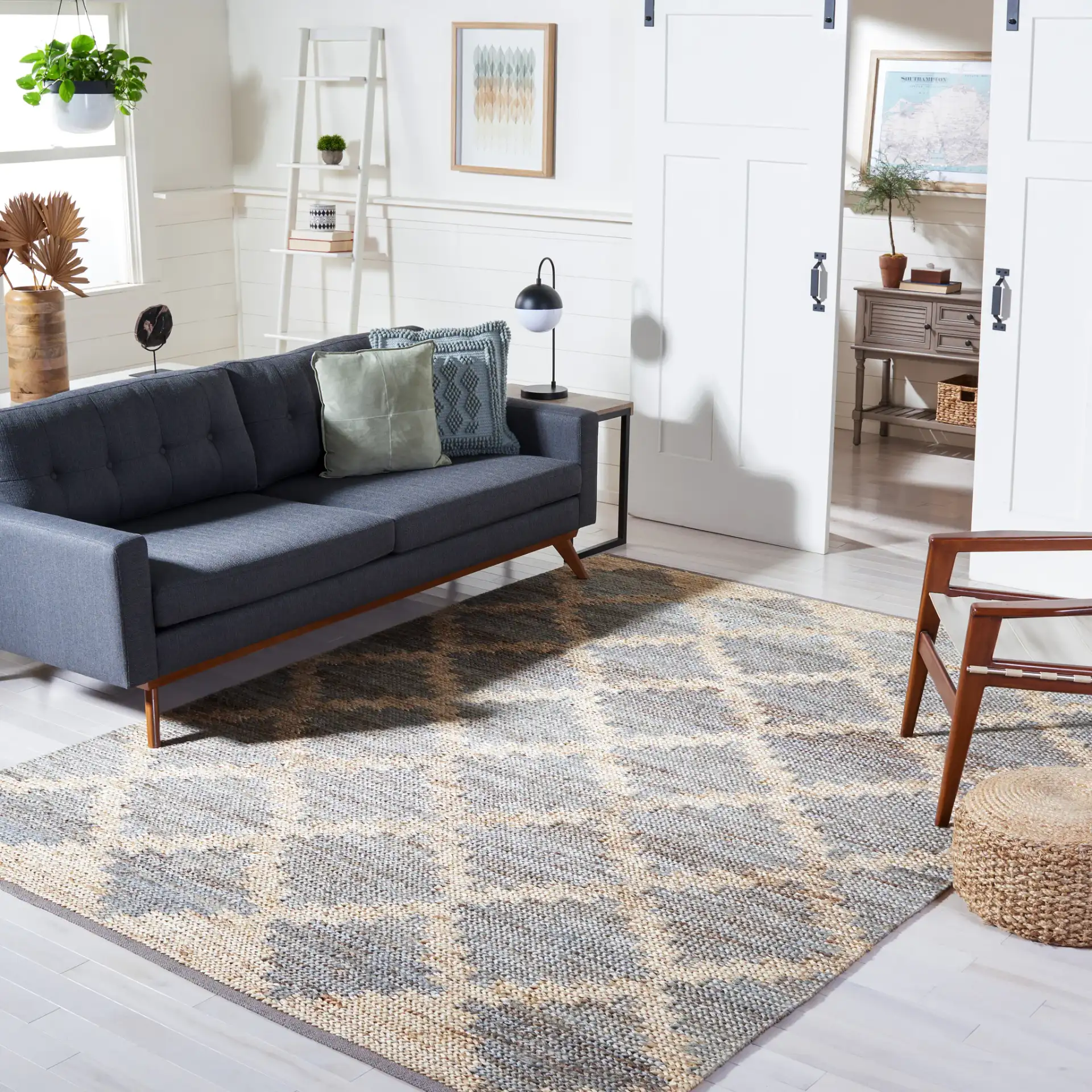 Kilim Tribal Diamond Jute Hand-Woven Rug in Natural / Gray in a styled room