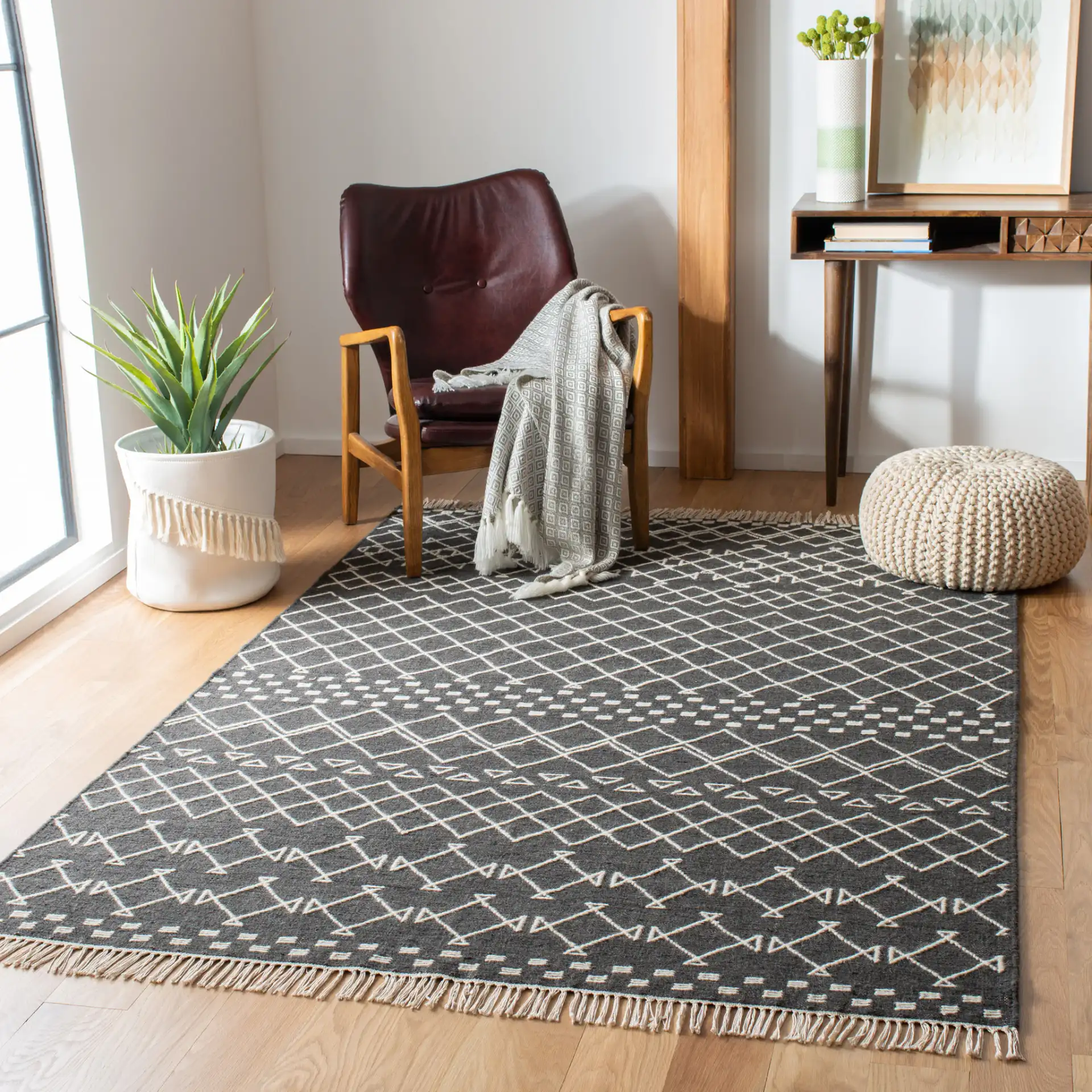 Kilim Banded Diamond Hand-Loomed Wool Rug in Charcoal / Ivory in a styled room