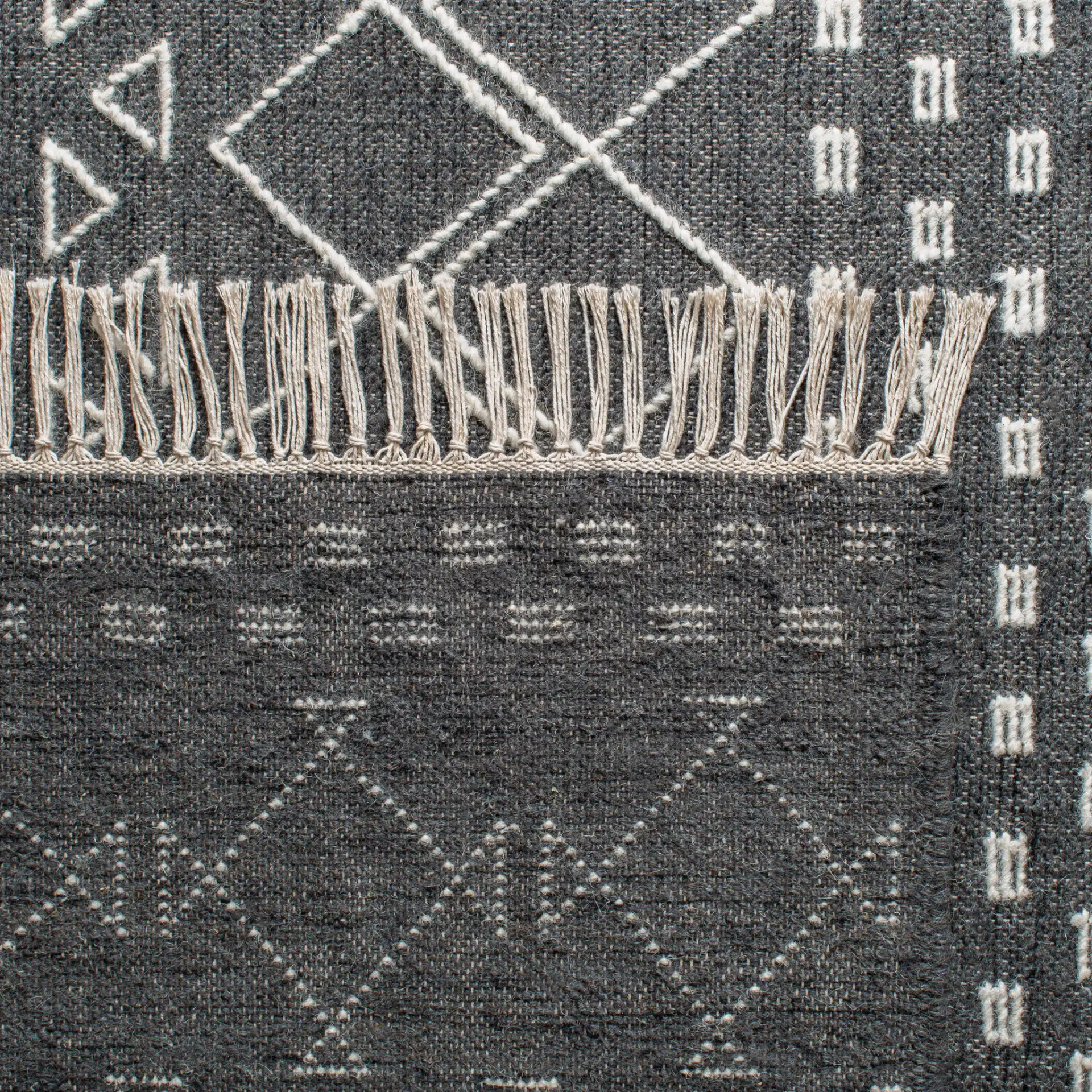 Kilim Banded Diamond Hand-Loomed Wool Rug in Charcoal / Ivory in a styled room