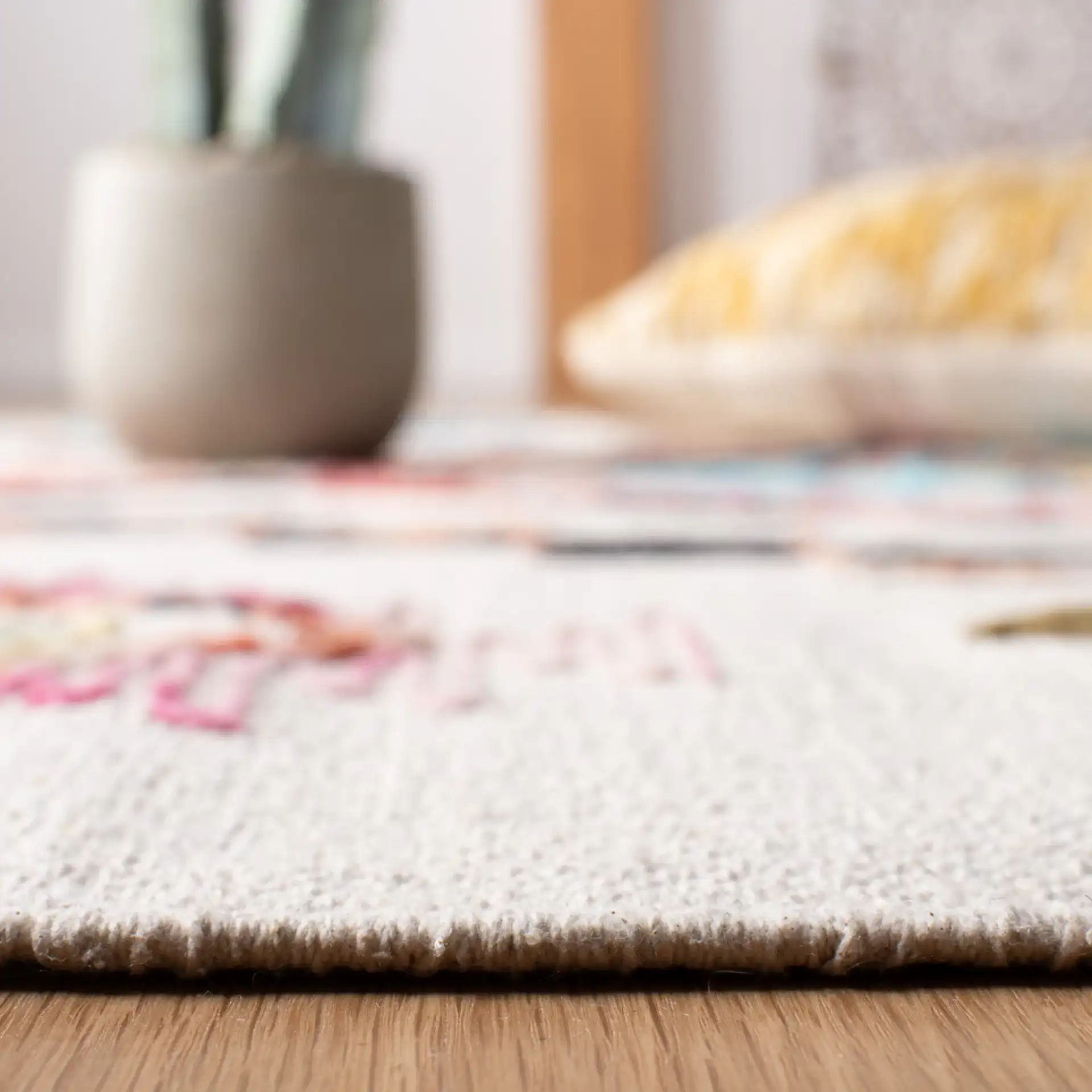Kilim Boho Diamond Flatweave Wool Rug in Ivory / Pink in a styled room