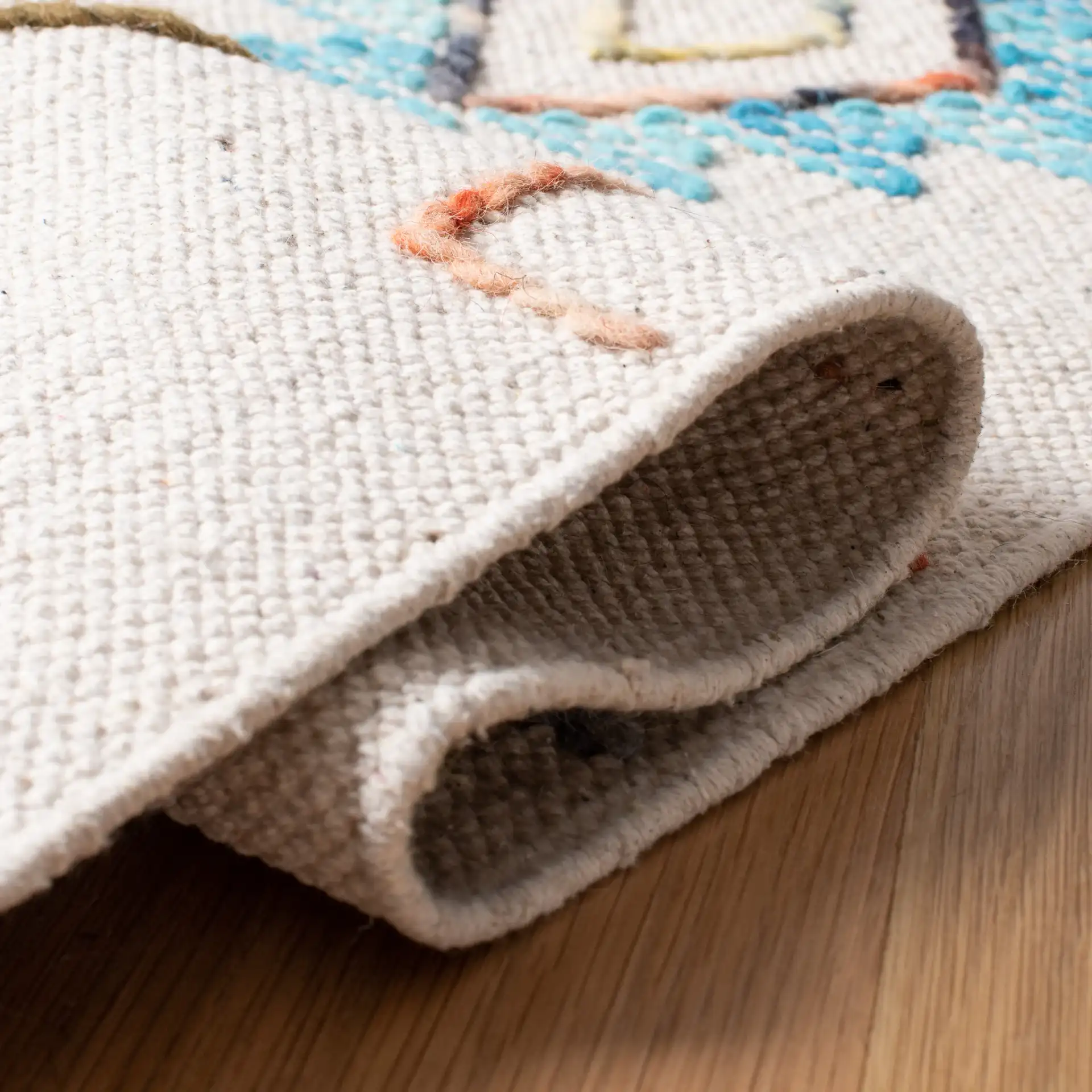Kilim Boho Diamond Flatweave Wool Rug in Ivory / Pink in a styled room