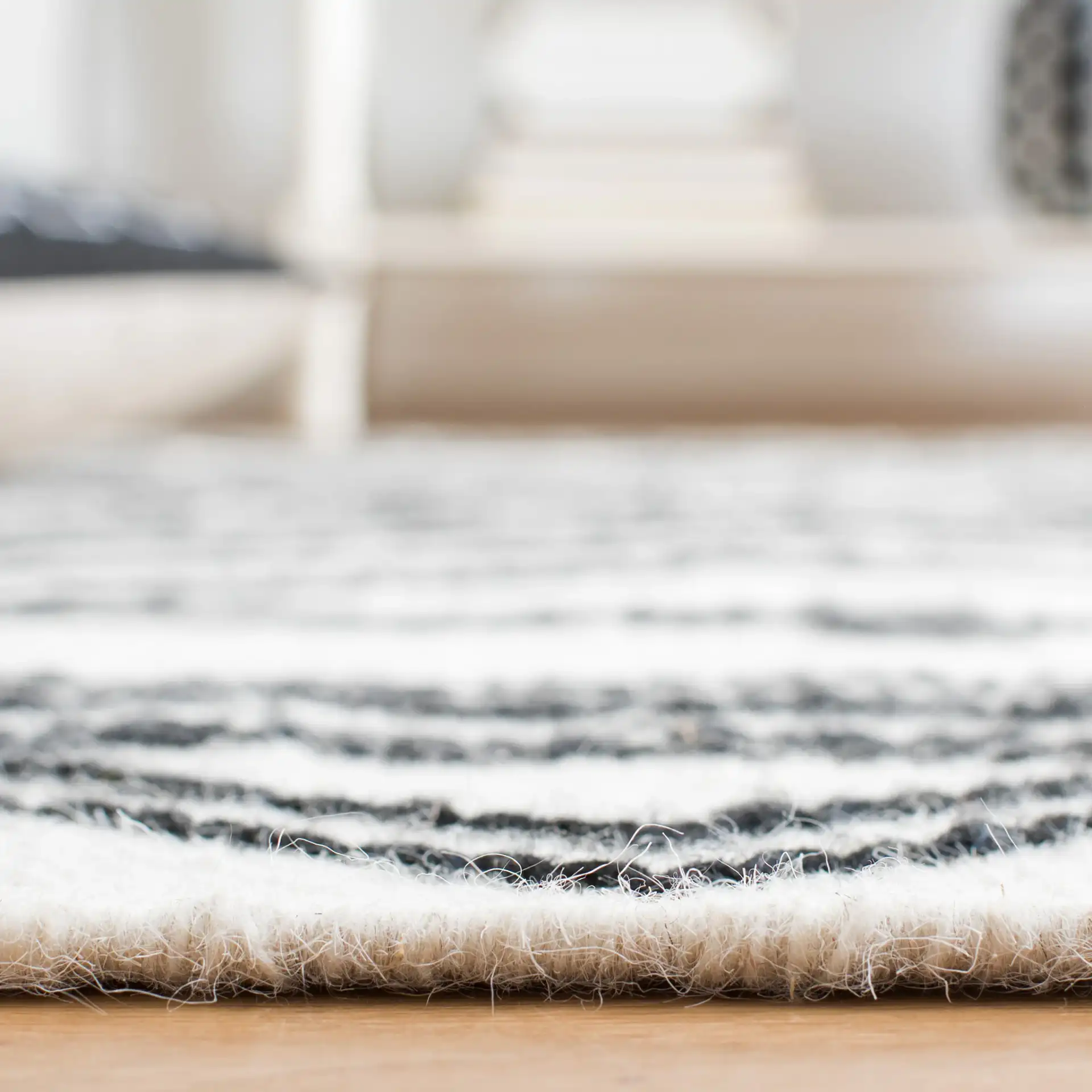 Kilim Diamond Zigzag Hand-Loomed Wool Rug in Ivory / Black in a styled room
