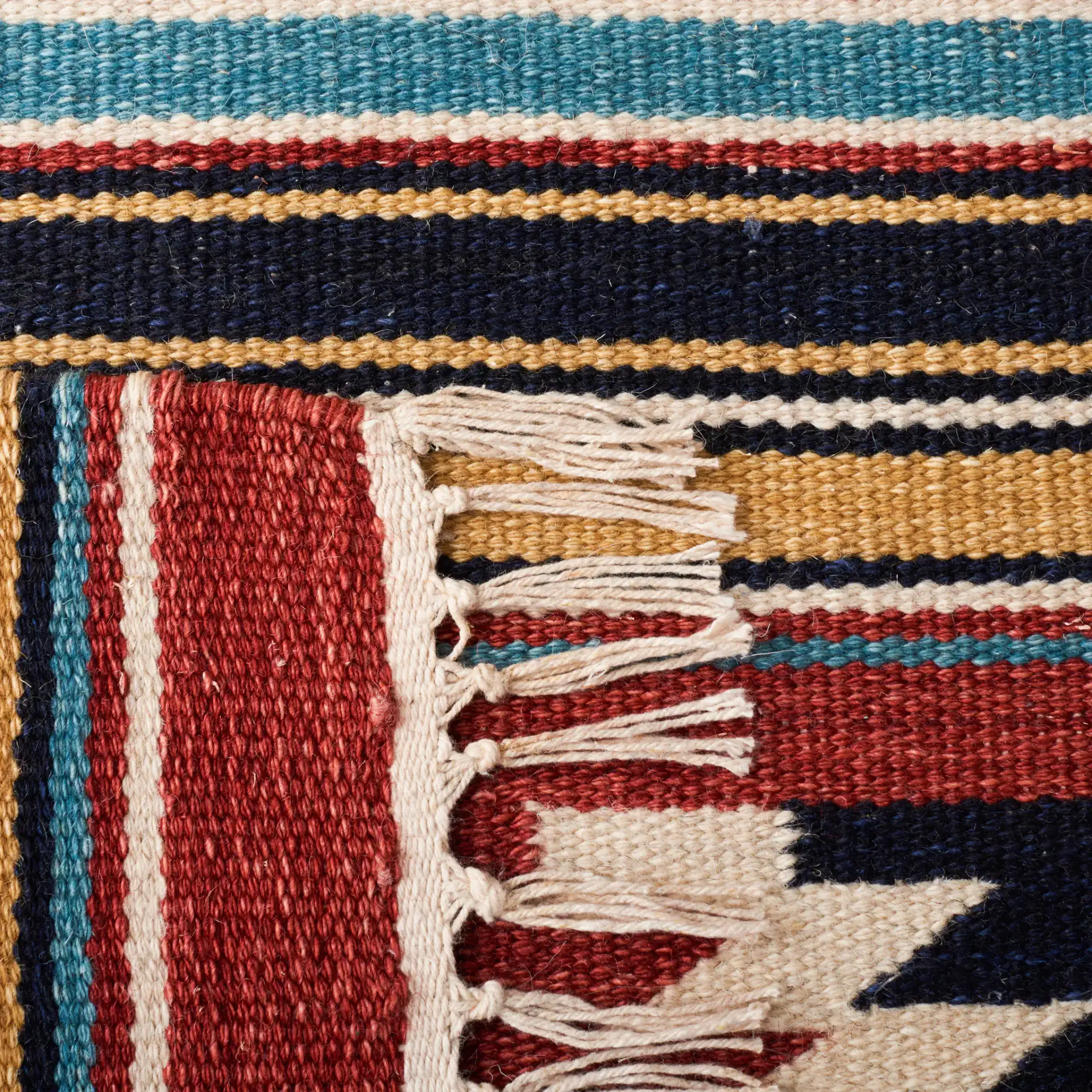 Kilim Banded Diamond Flatweave Wool Rug in Ivory / Rust in a styled room