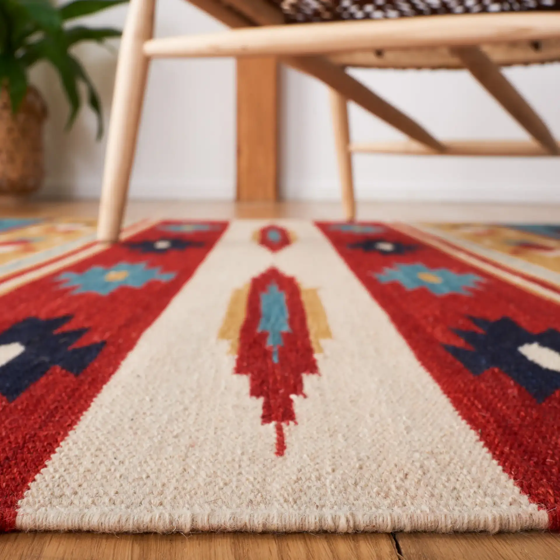 Kilim Tribal Stripe Flatweave Wool Rug in Beige / Red in a styled room