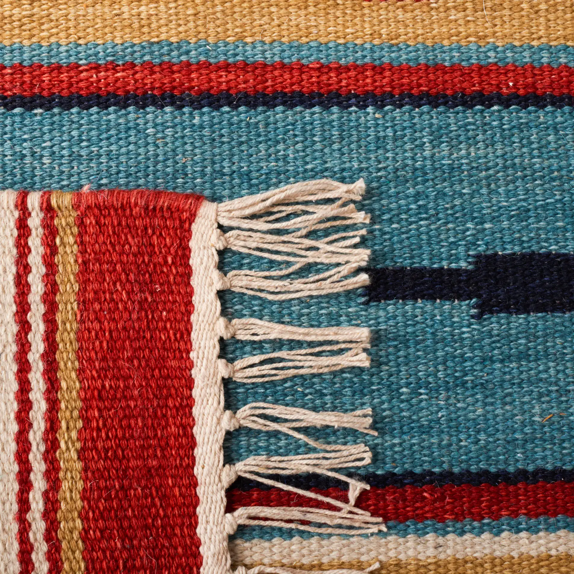 Kilim Tribal Stripe Flatweave Wool Rug in Beige / Red in a styled room