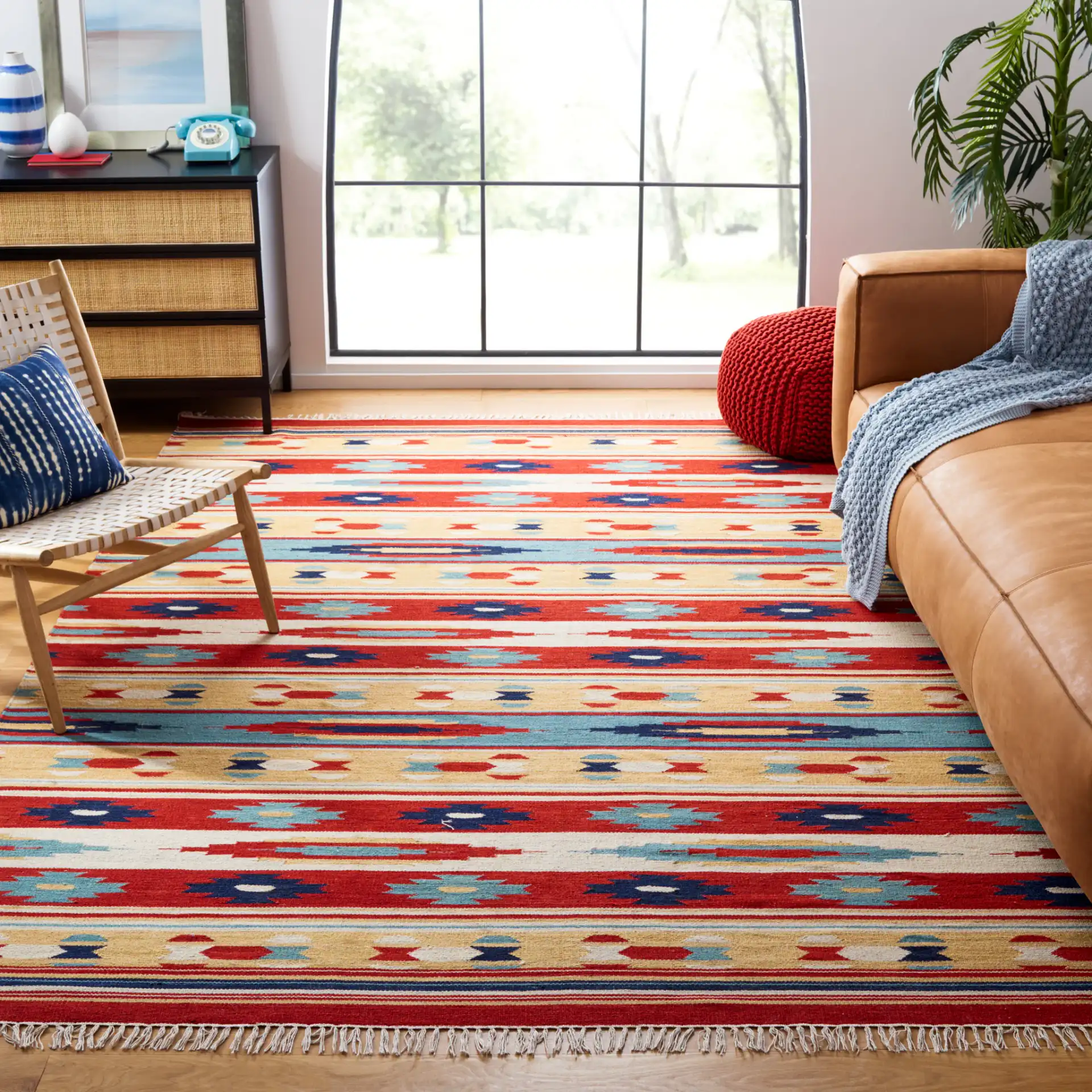Kilim Tribal Stripe Flatweave Wool Rug in Beige / Red in a styled room