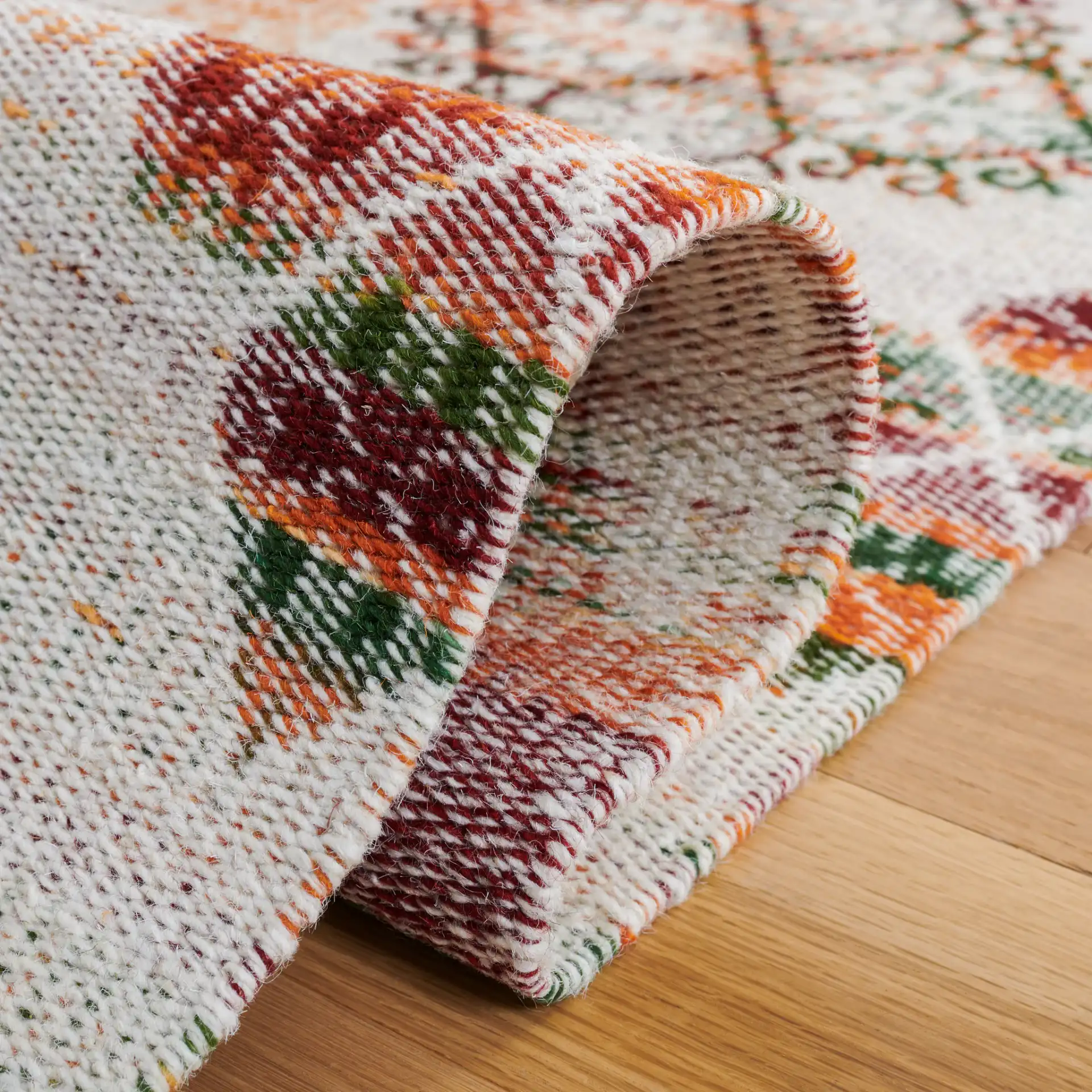 Kilim Tribal Trellis Flatweave Wool Rug in Ivory / Gold in a styled room