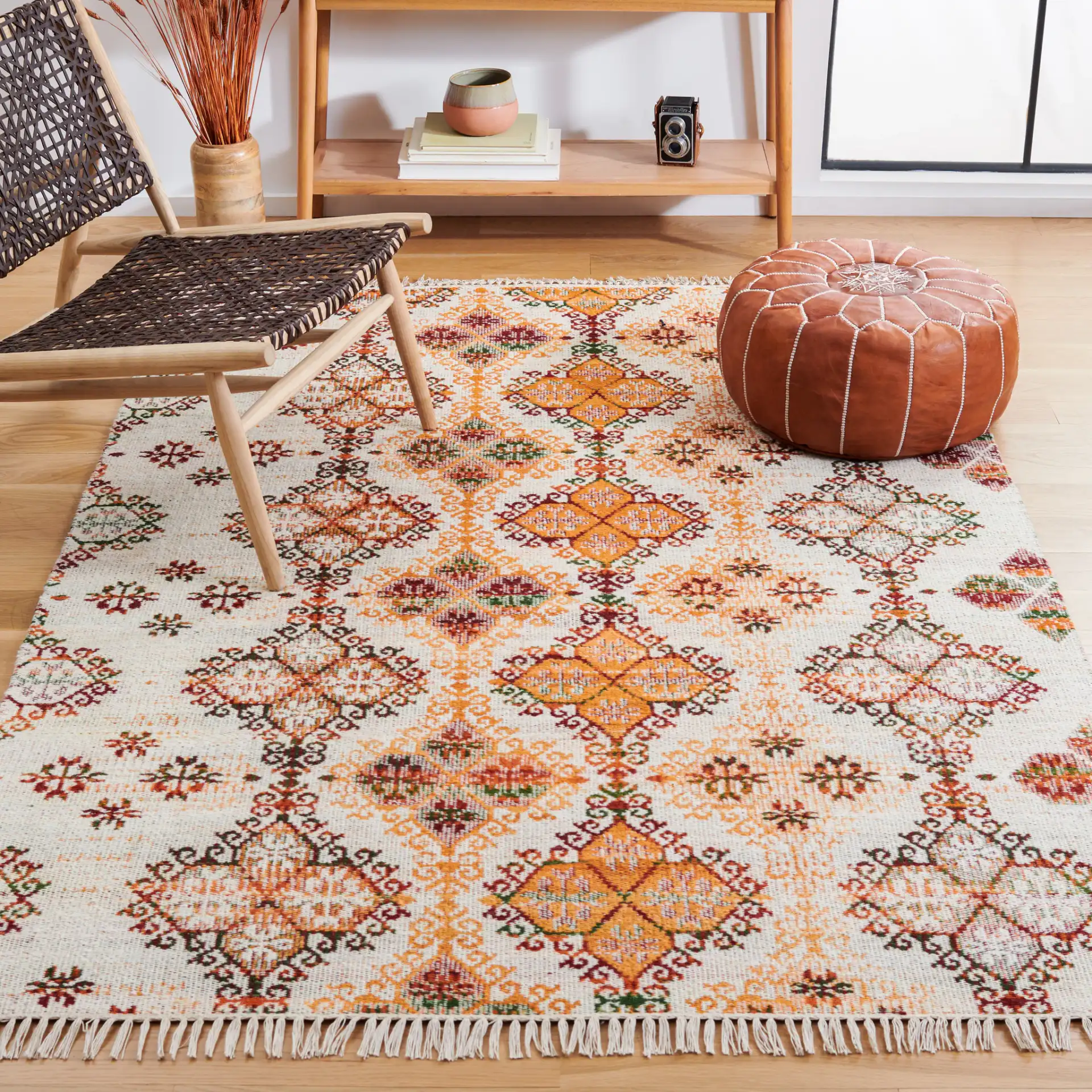 Kilim Tribal Trellis Flatweave Wool Rug in Ivory / Gold in a styled room
