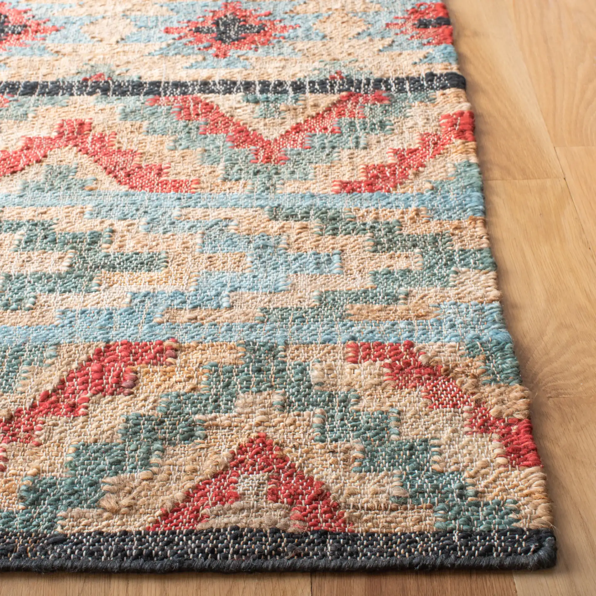 Kilim Stepped Diamond Flatweave Jute Rug in Natural / Red in a styled room