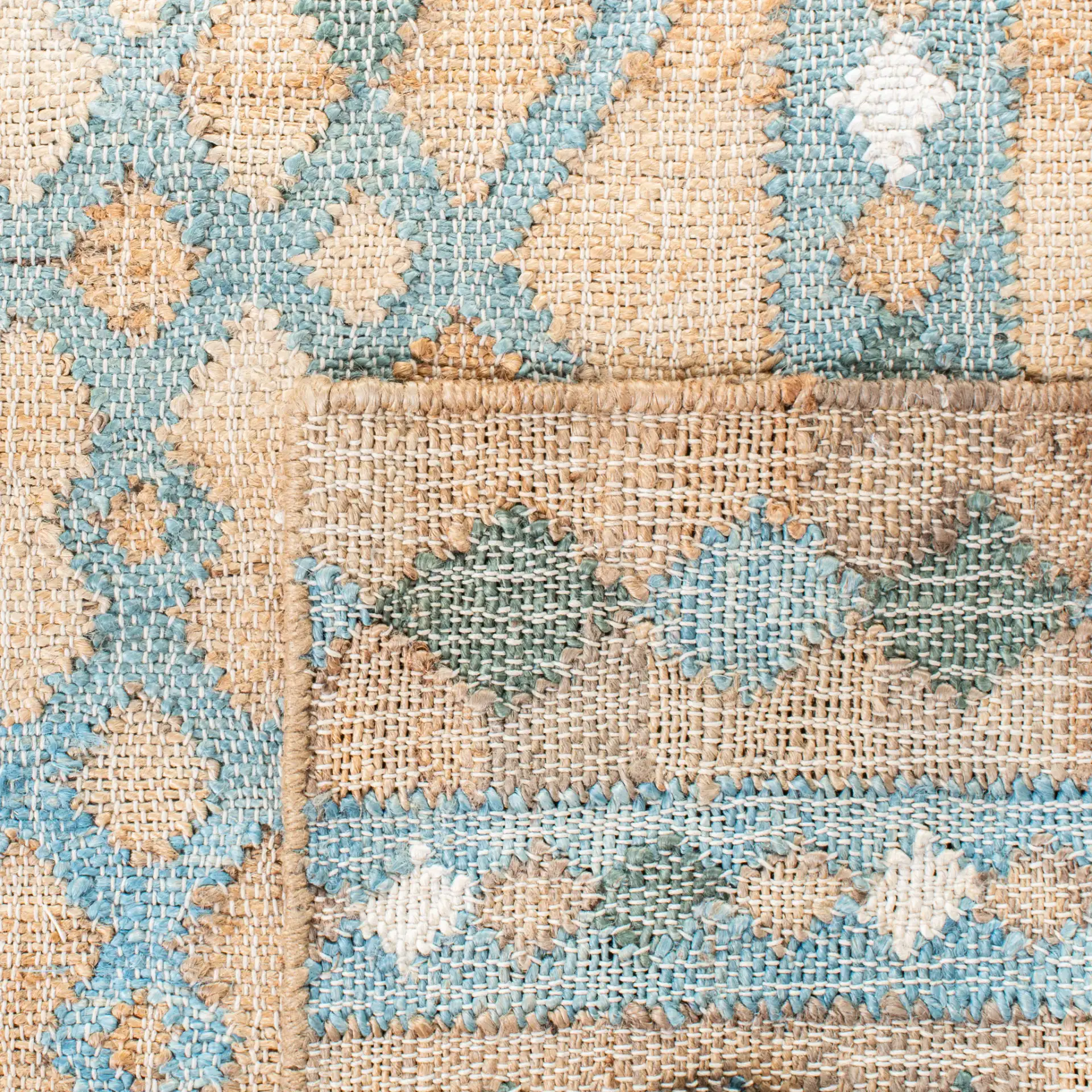 Kilim Diamond Stripe Flatweave Jute Rug in Natural / Blue in a styled room