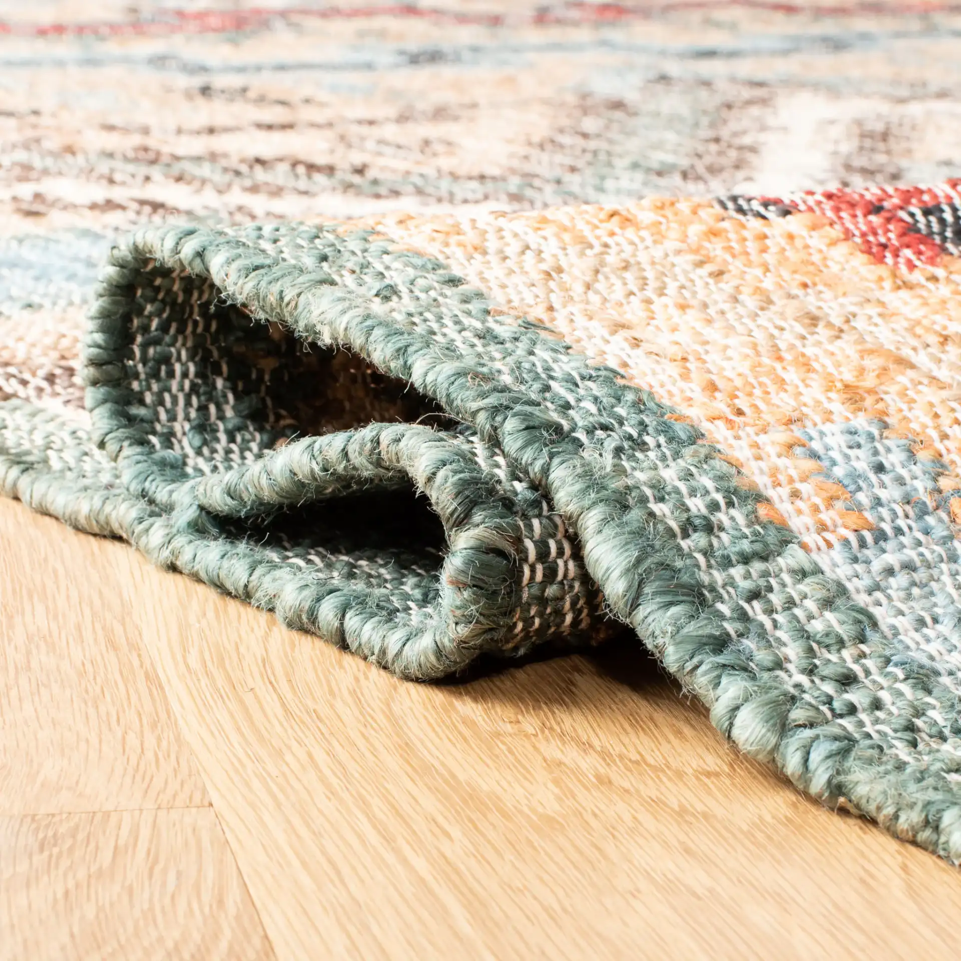 Kilim Diamond Flatweave Jute Rug in Natural / Blue in a styled room