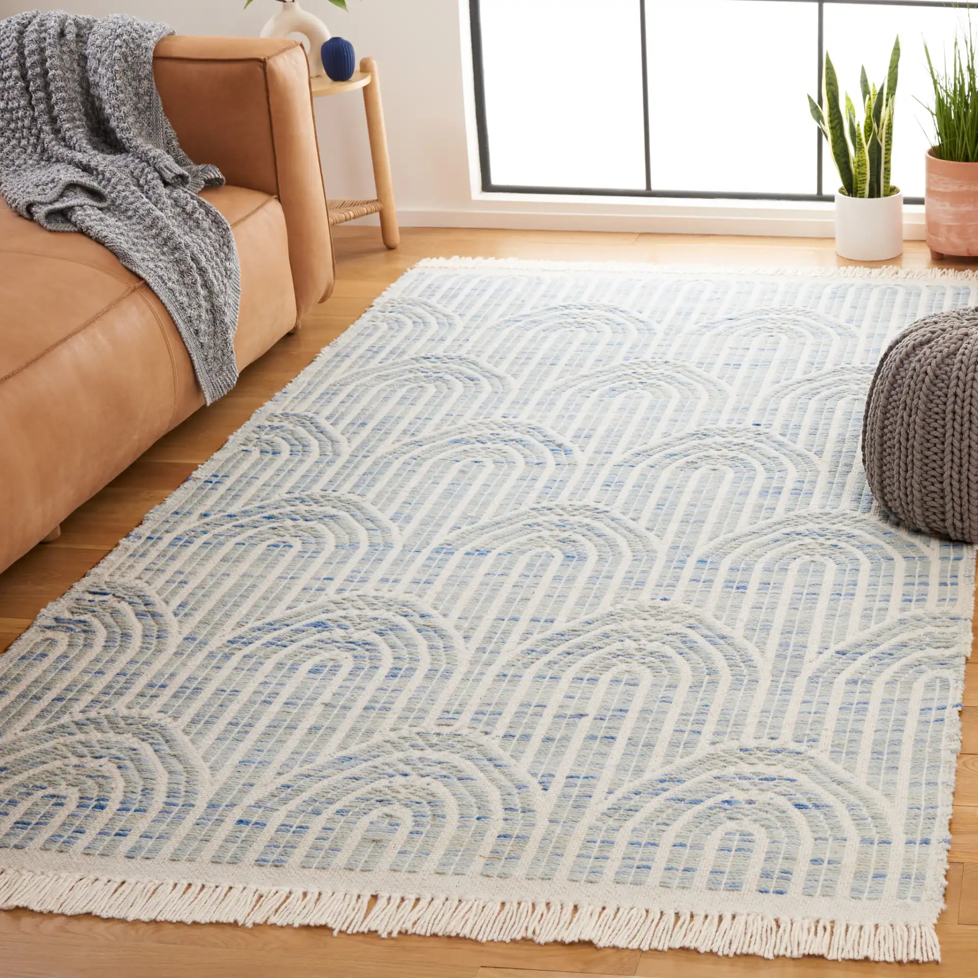 Kilim Arch Hand-Woven Wool Rug in Blue / Ivory in a styled room