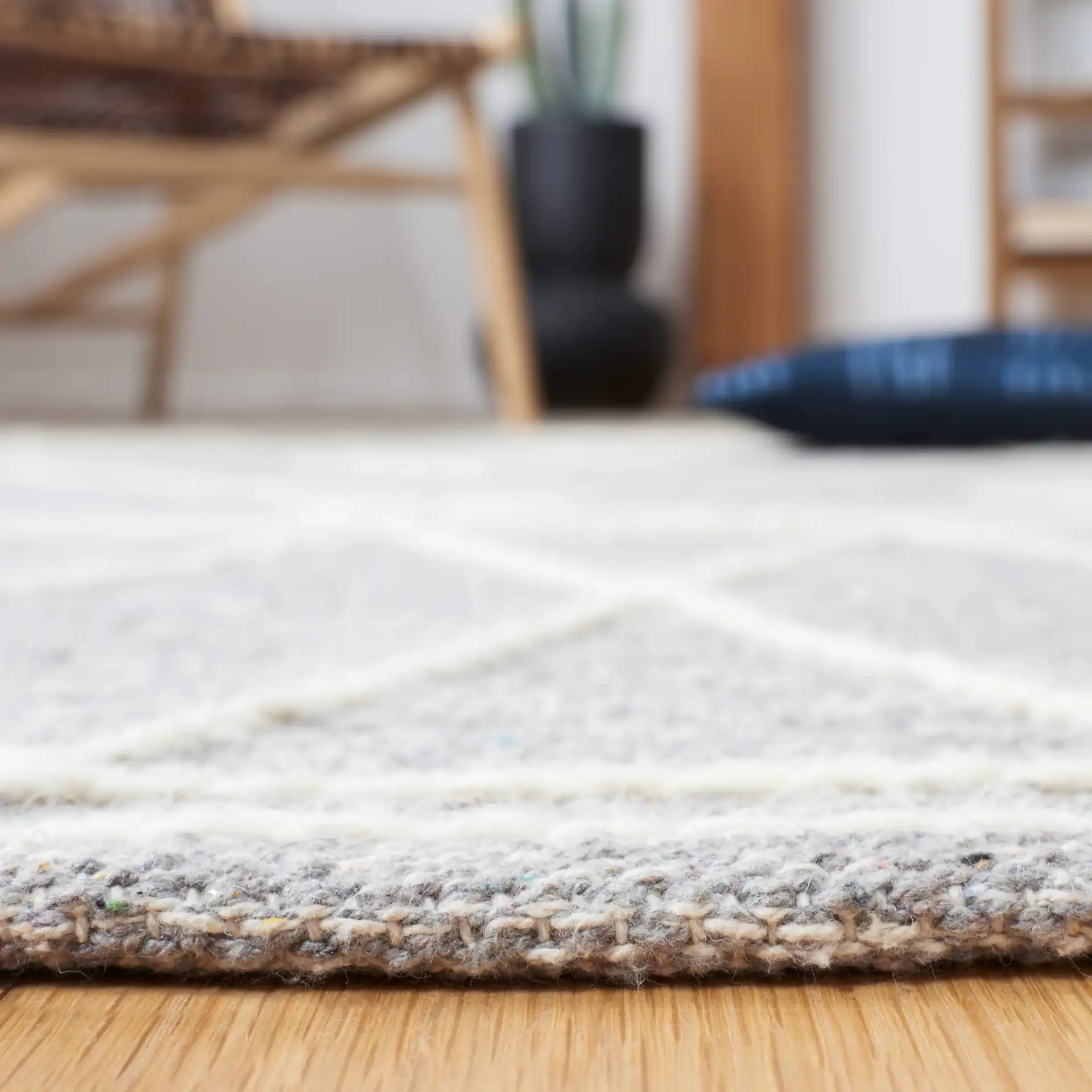 Kilim Nested Diamond Hand-Woven Rug in Gray / Ivory in a styled room