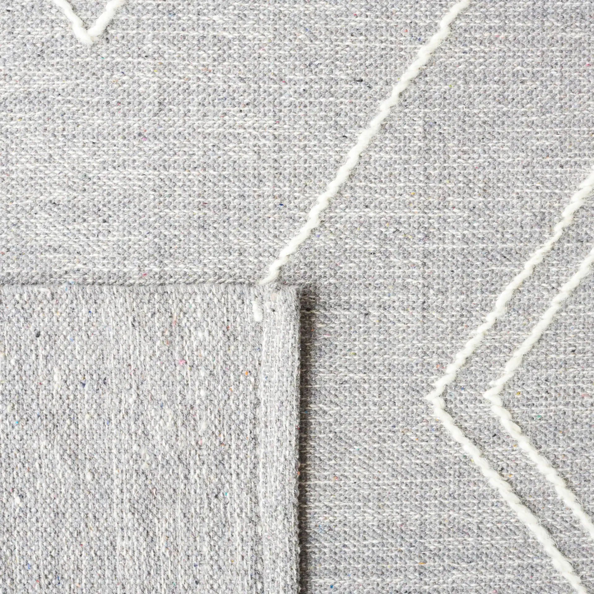 Kilim Nested Diamond Hand-Woven Rug in Gray / Ivory in a styled room