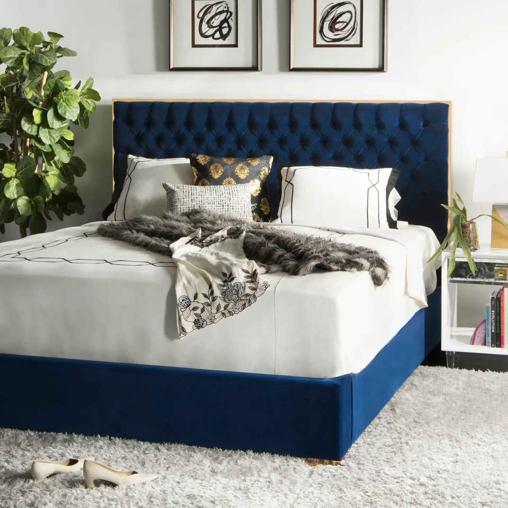 Chester Queen Bed in Navy in a styled room