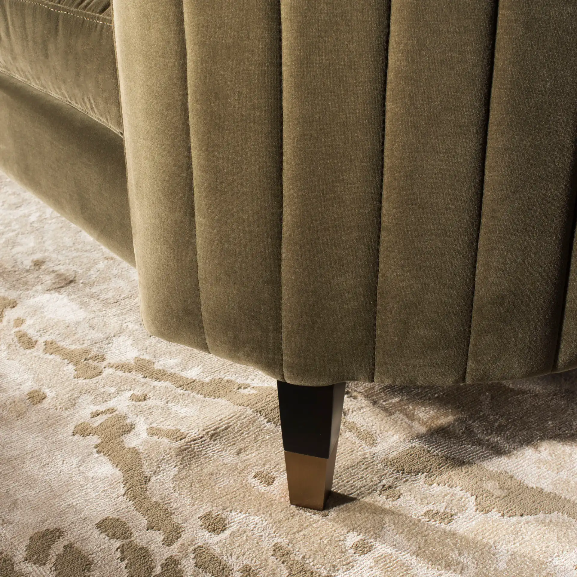 Winford Velvet Sofa in Olive / Black in a styled room