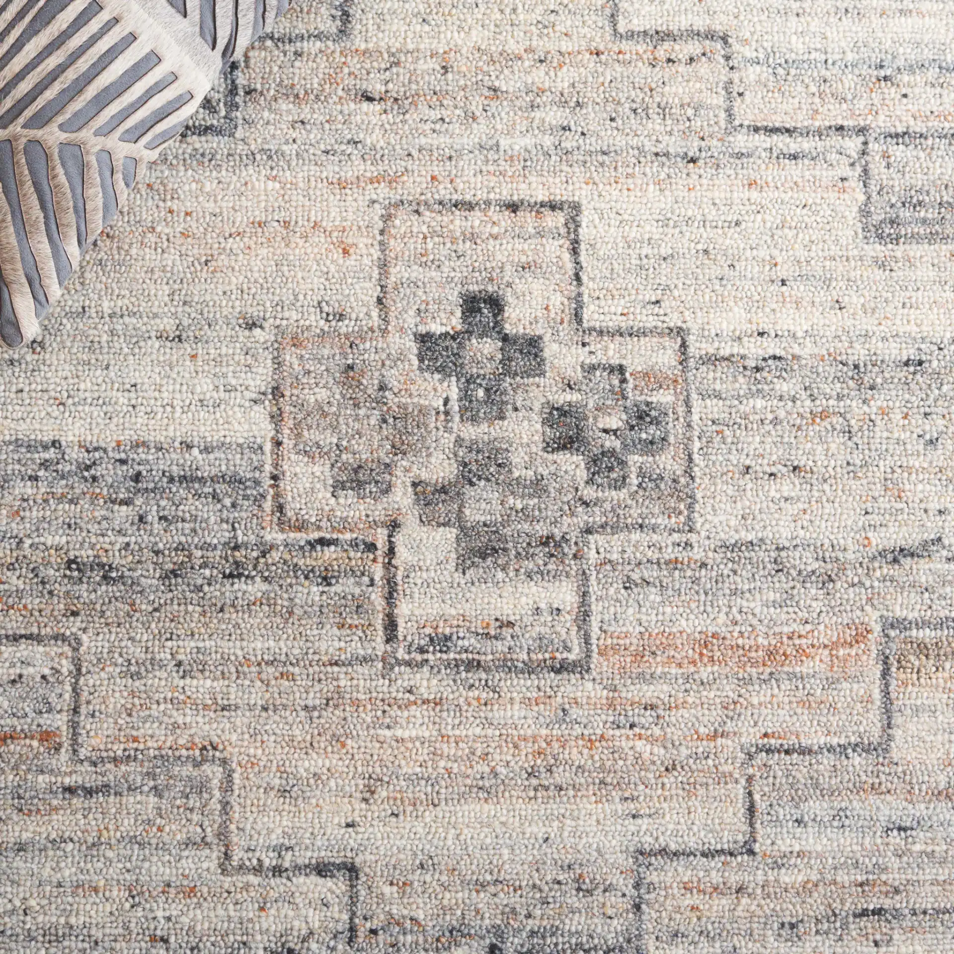 Kenya Tribal Medallion Hand-Tufted Wool Rug in Brown / Beige in a styled room