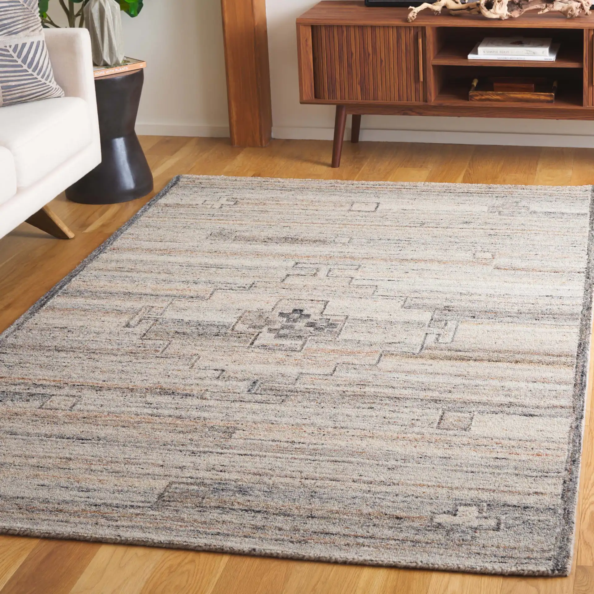 Kenya Tribal Medallion Hand-Tufted Wool Rug in Brown / Beige in a styled room