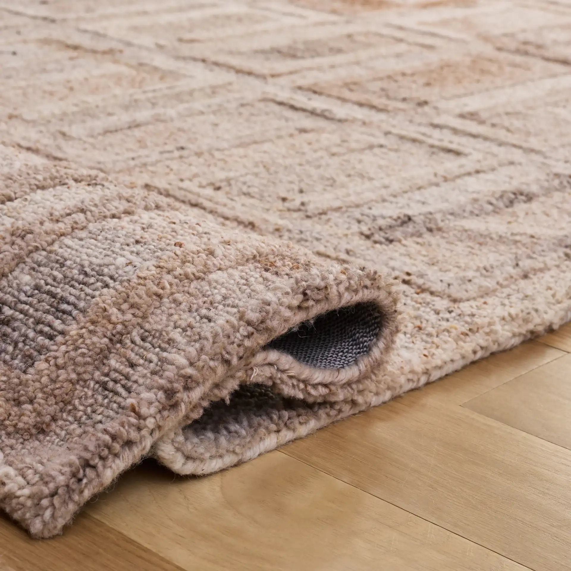 Kenya Modern Geometric Hand-Tufted Wool Rug in Brown / Gray in a styled room