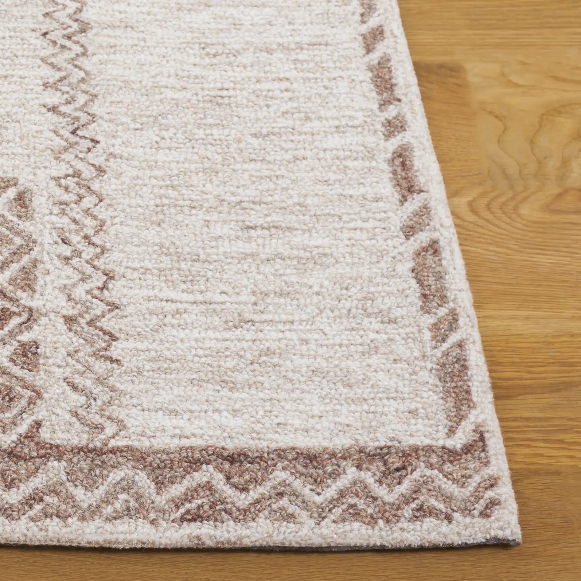 Kenya Tribal Diamond Hand-Tufted Wool Rug in Brown / Beige in a styled room