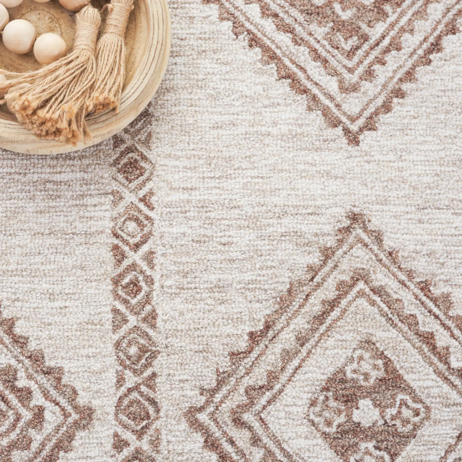 Kenya Tribal Diamond Hand-Tufted Wool Rug in Brown / Beige in a styled room