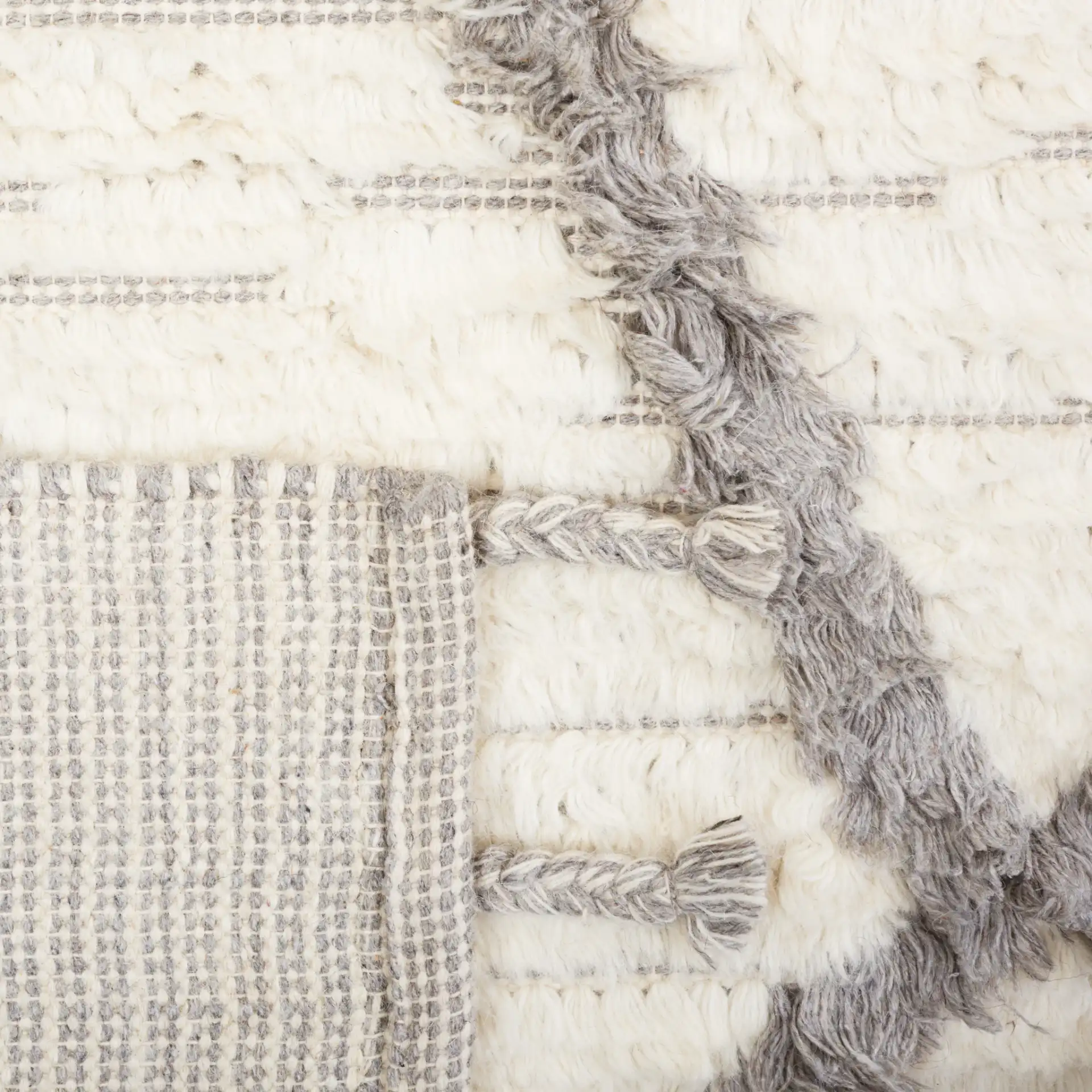 Kenya Textured Diamond Trellis Hand-Woven Shag Wool Rug in Ivory / Gray in a styled room