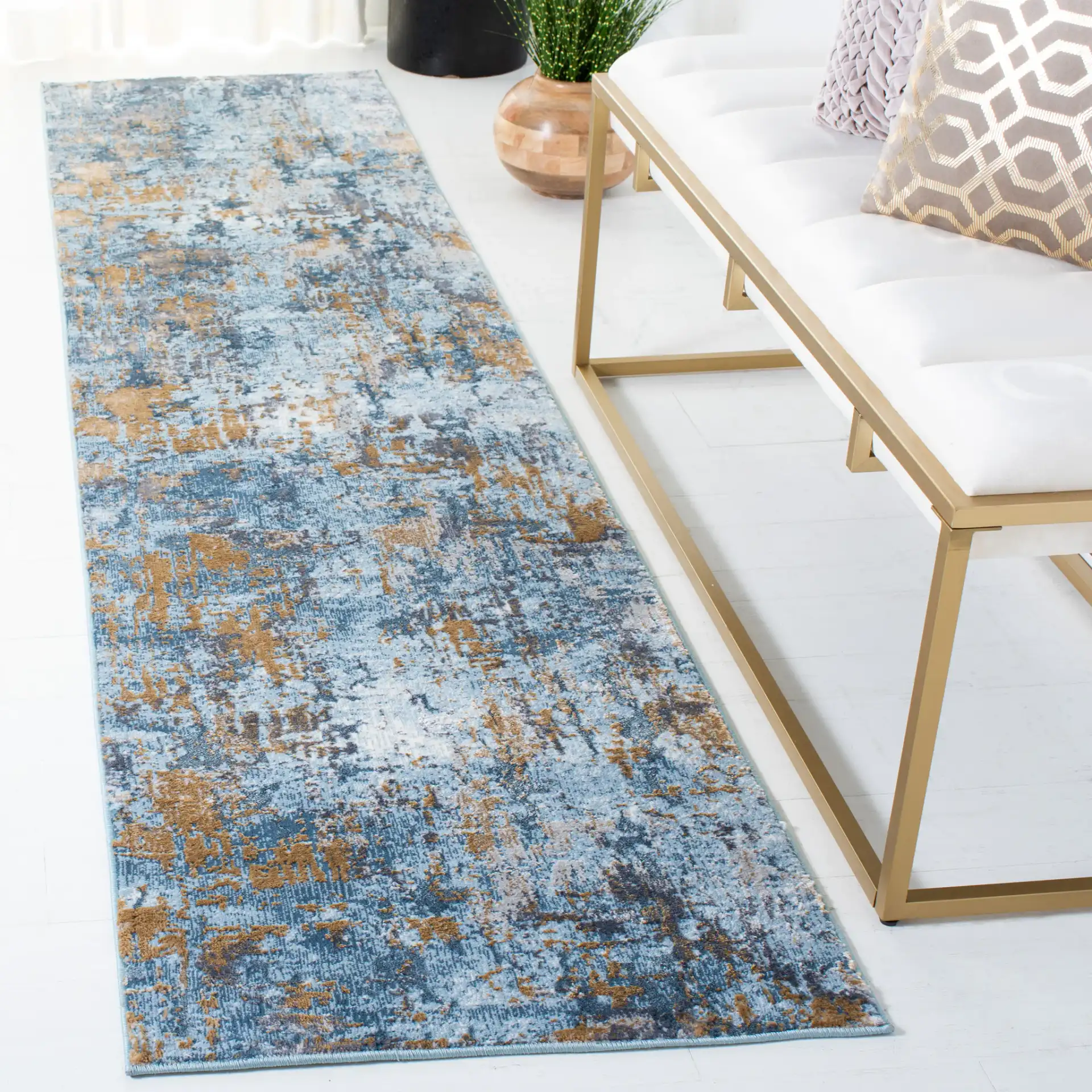 Lagoon Abstract Drip Rug in Gray / Blue in a styled room