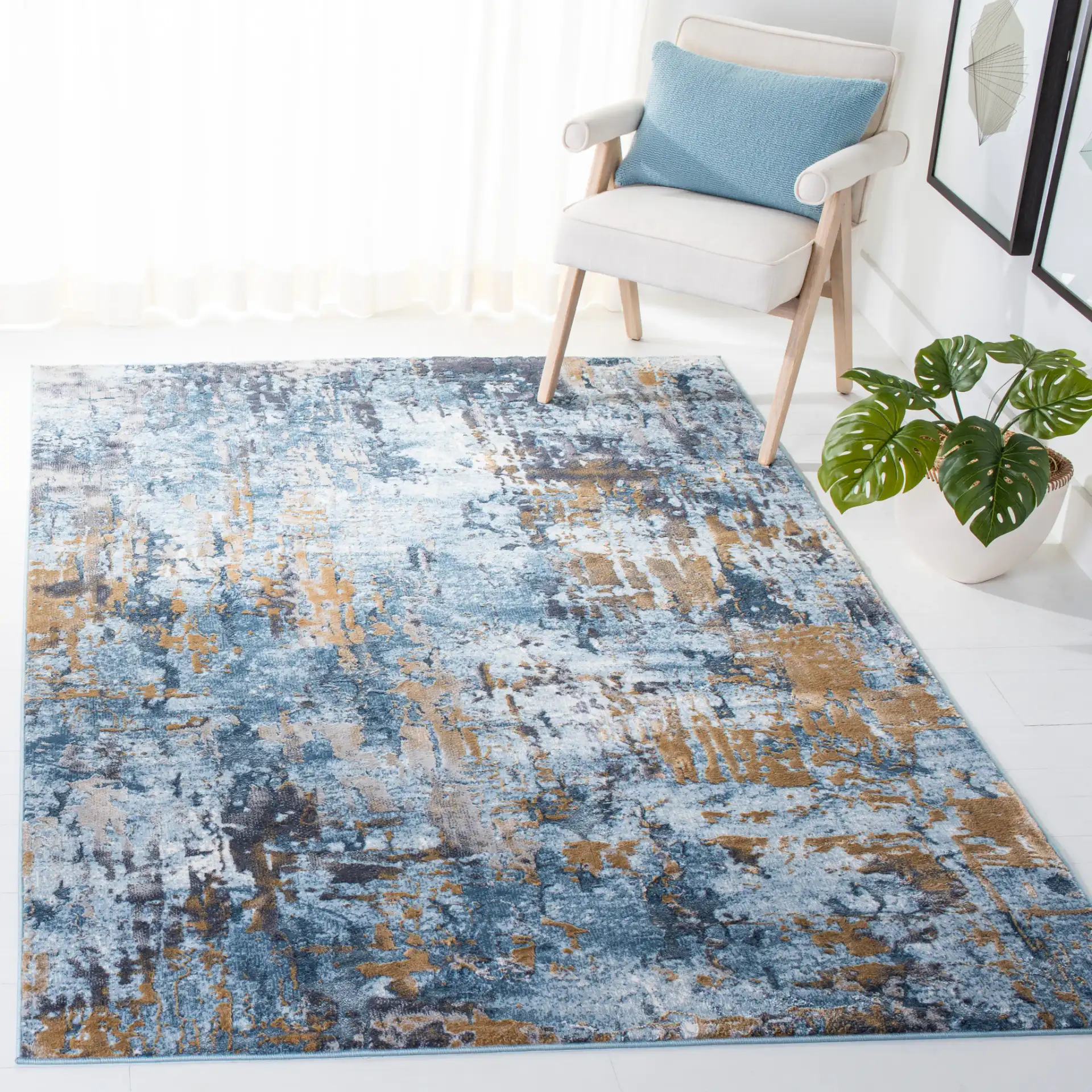 Lagoon Abstract Drip Rug in Gray / Blue in a styled room