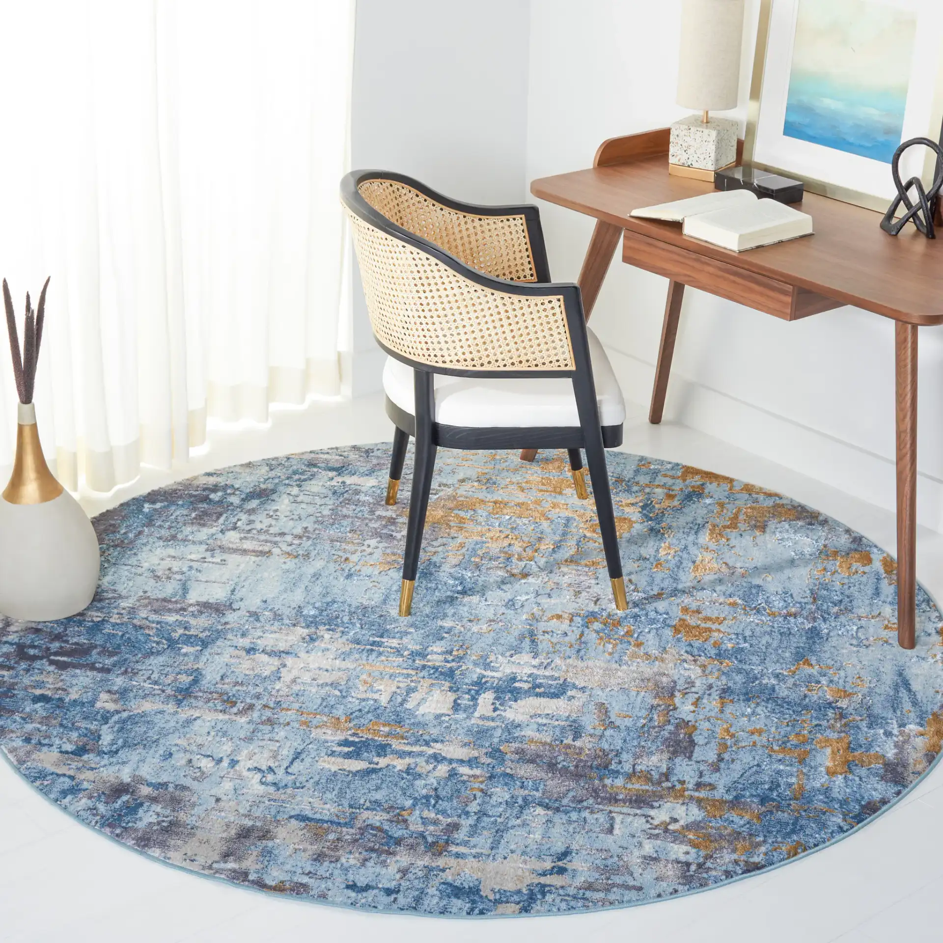 Lagoon Abstract Drip Rug in Gray / Blue in a styled room