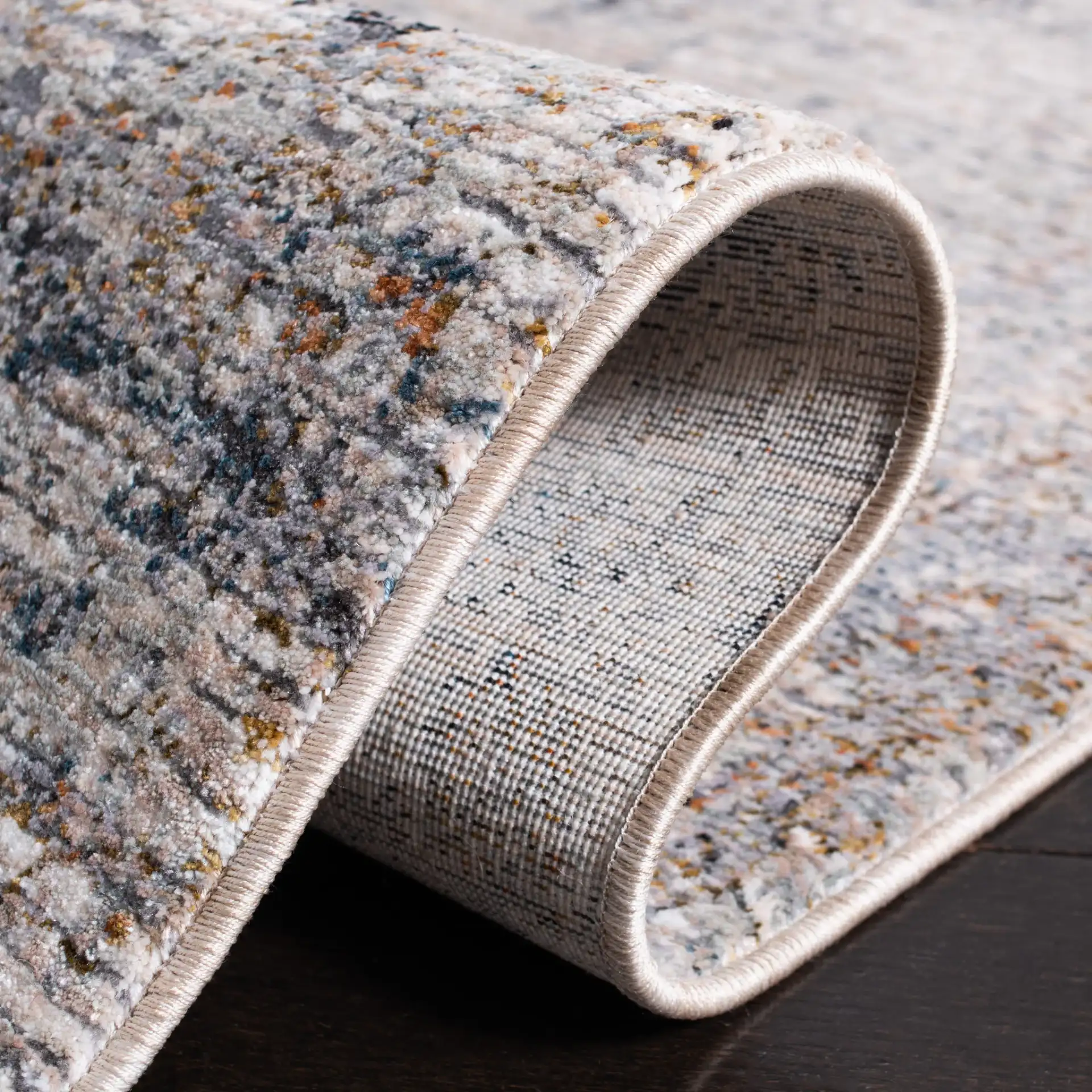 Limitee Abstract Rug in Beige in a styled room