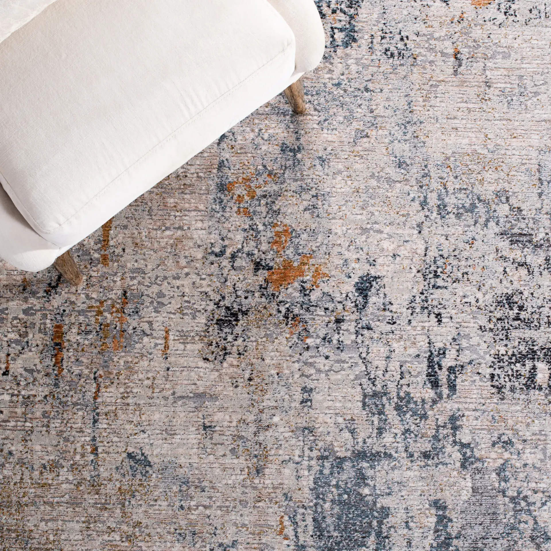 Limitee Abstract Rug in Beige in a styled room