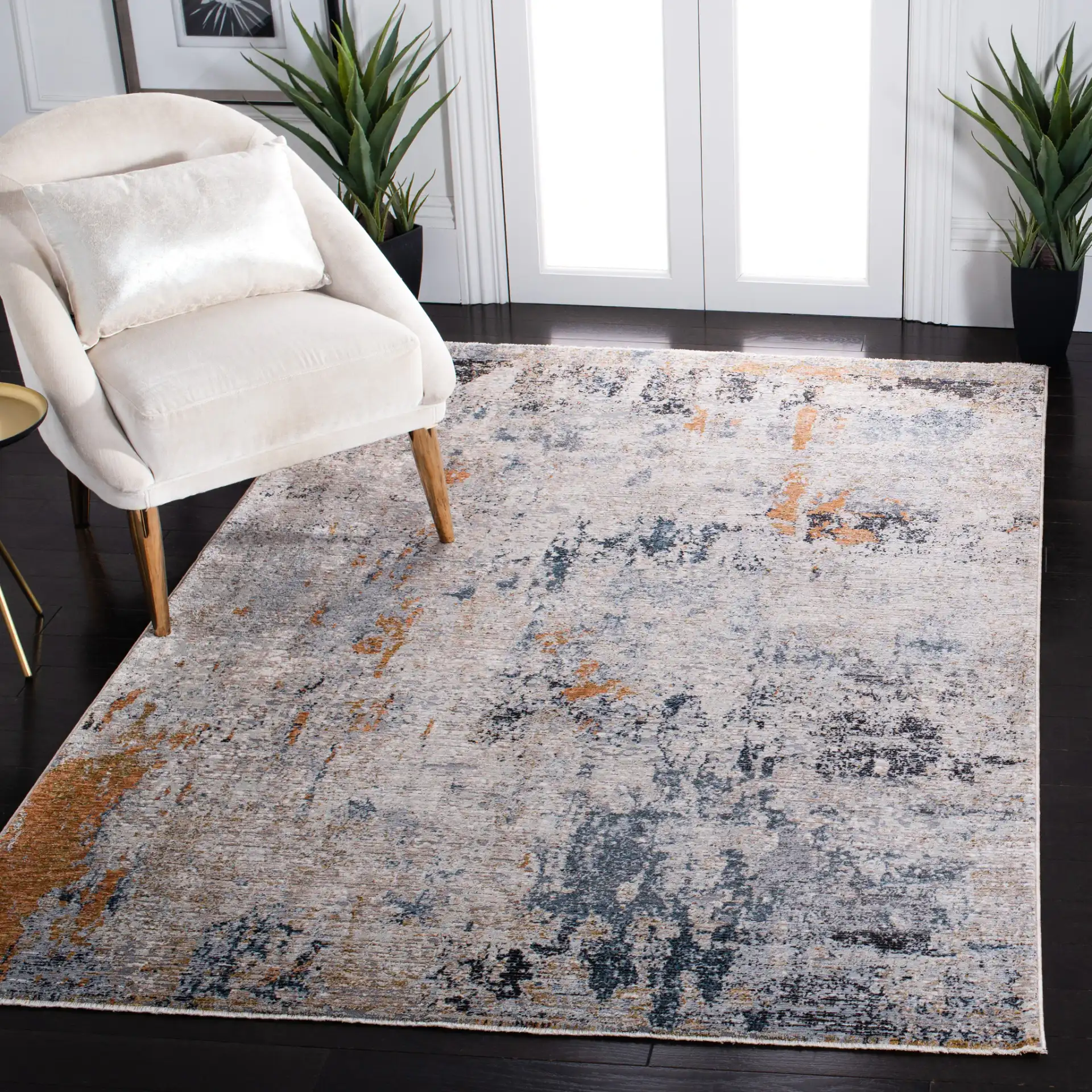 Limitee Abstract Rug in Beige in a styled room